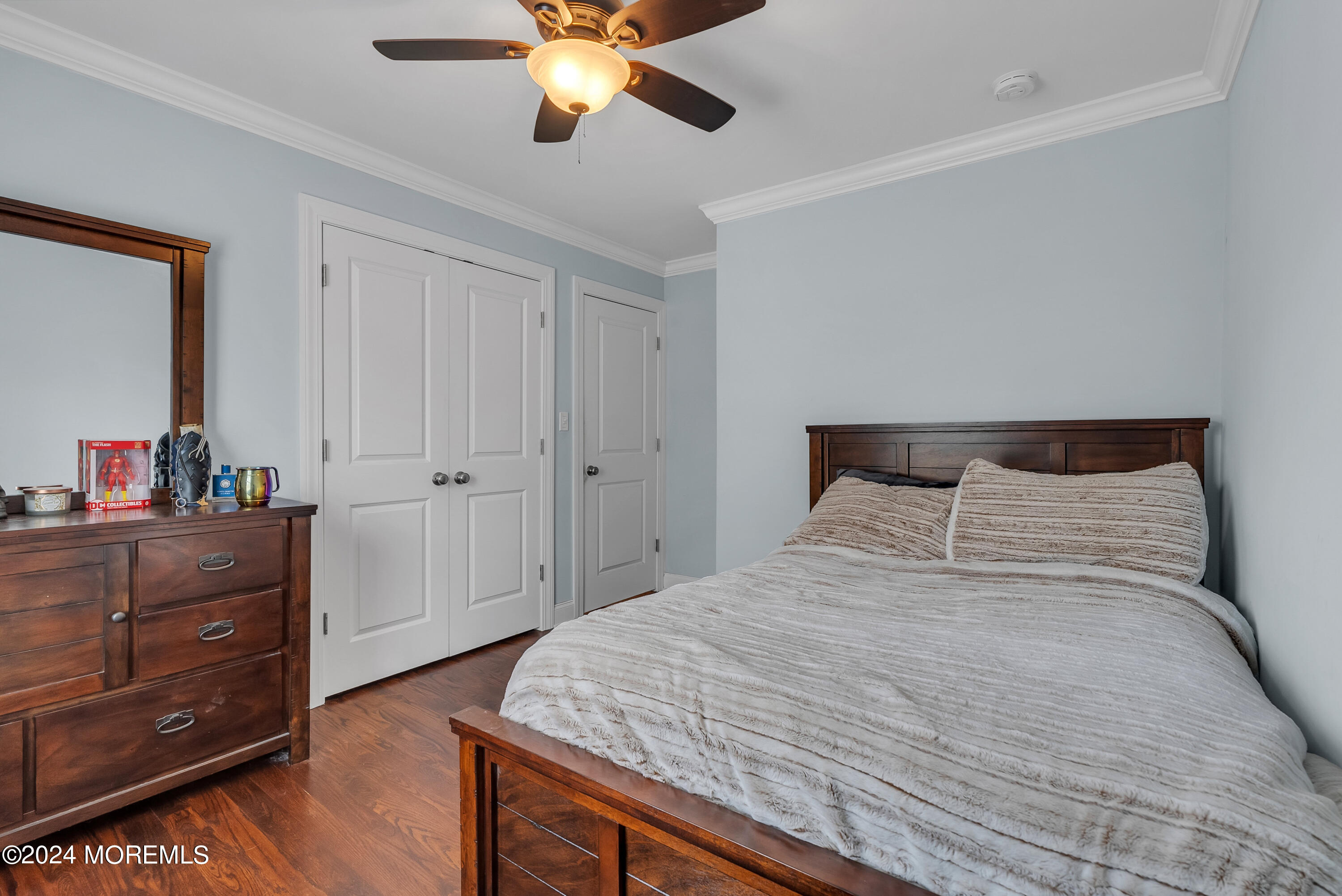 877 Hyson Road Jackson, NJ 08527 - Photo 15 of 35 a bedroom with a bed and a dresser