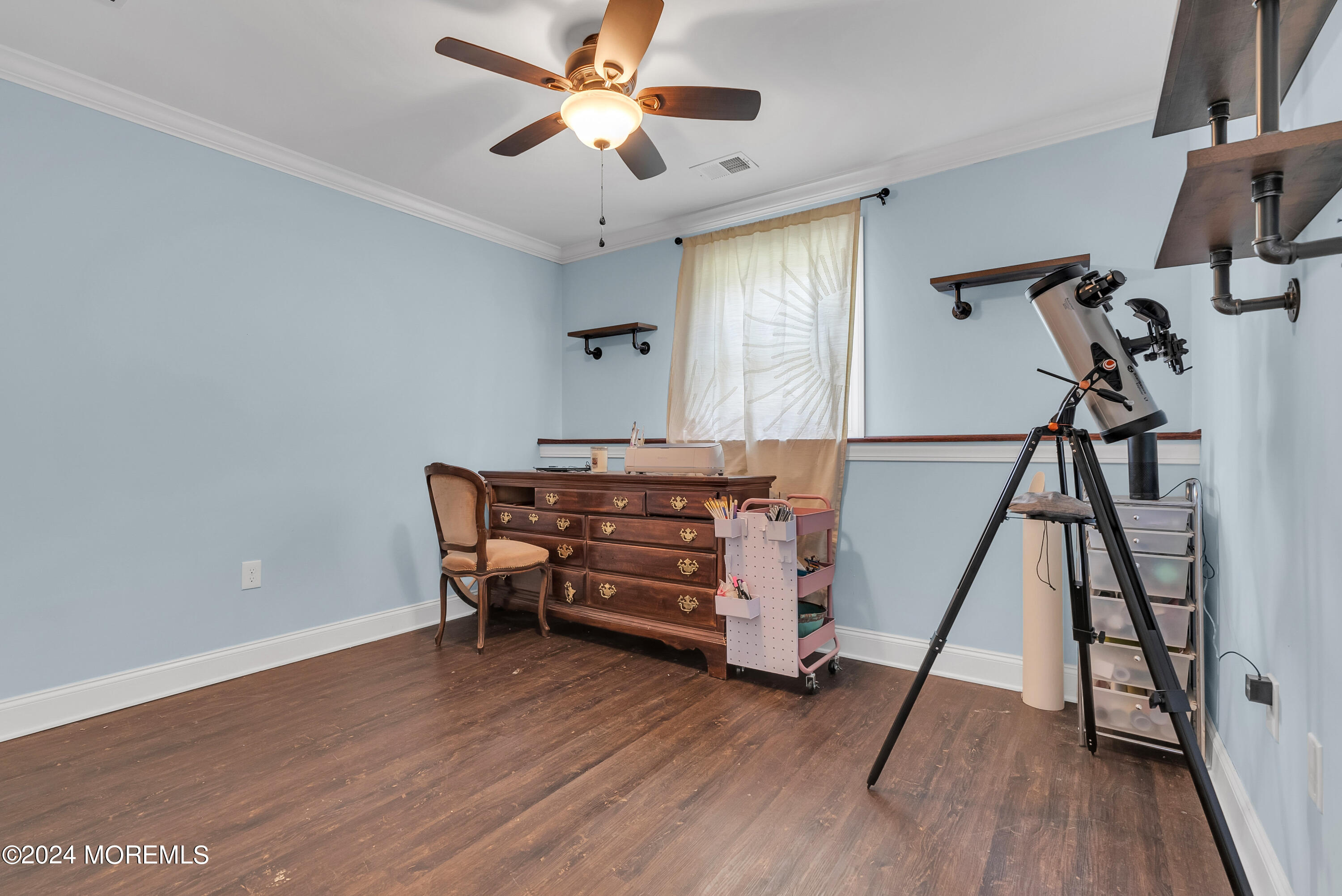 877 Hyson Road Jackson, NJ 08527 - Photo 18 of 35 a room with furniture and wooden floor
