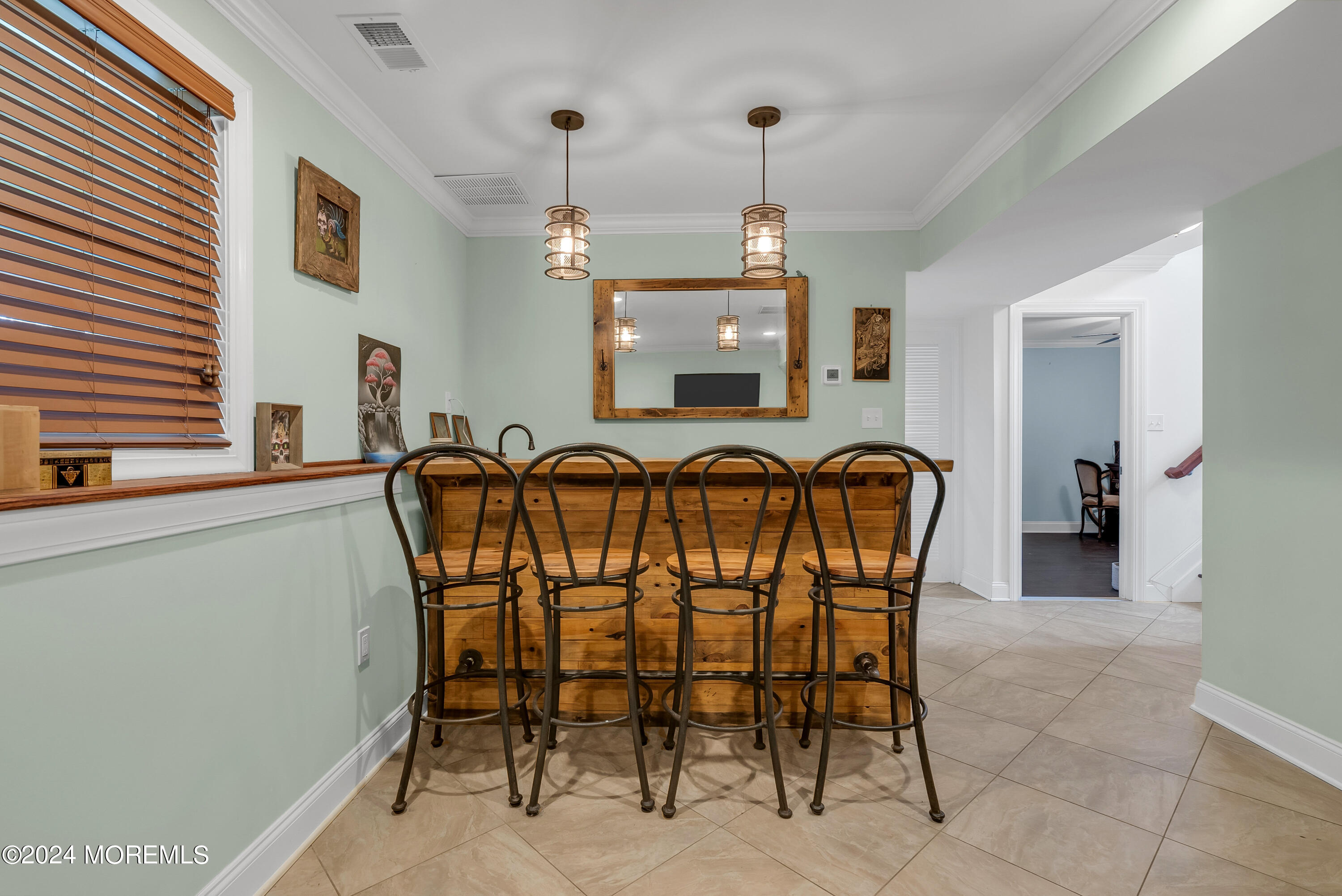 877 Hyson Road Jackson, NJ 08527 - Photo 22 of 35 a view of a dining room with furniture and chandelier
