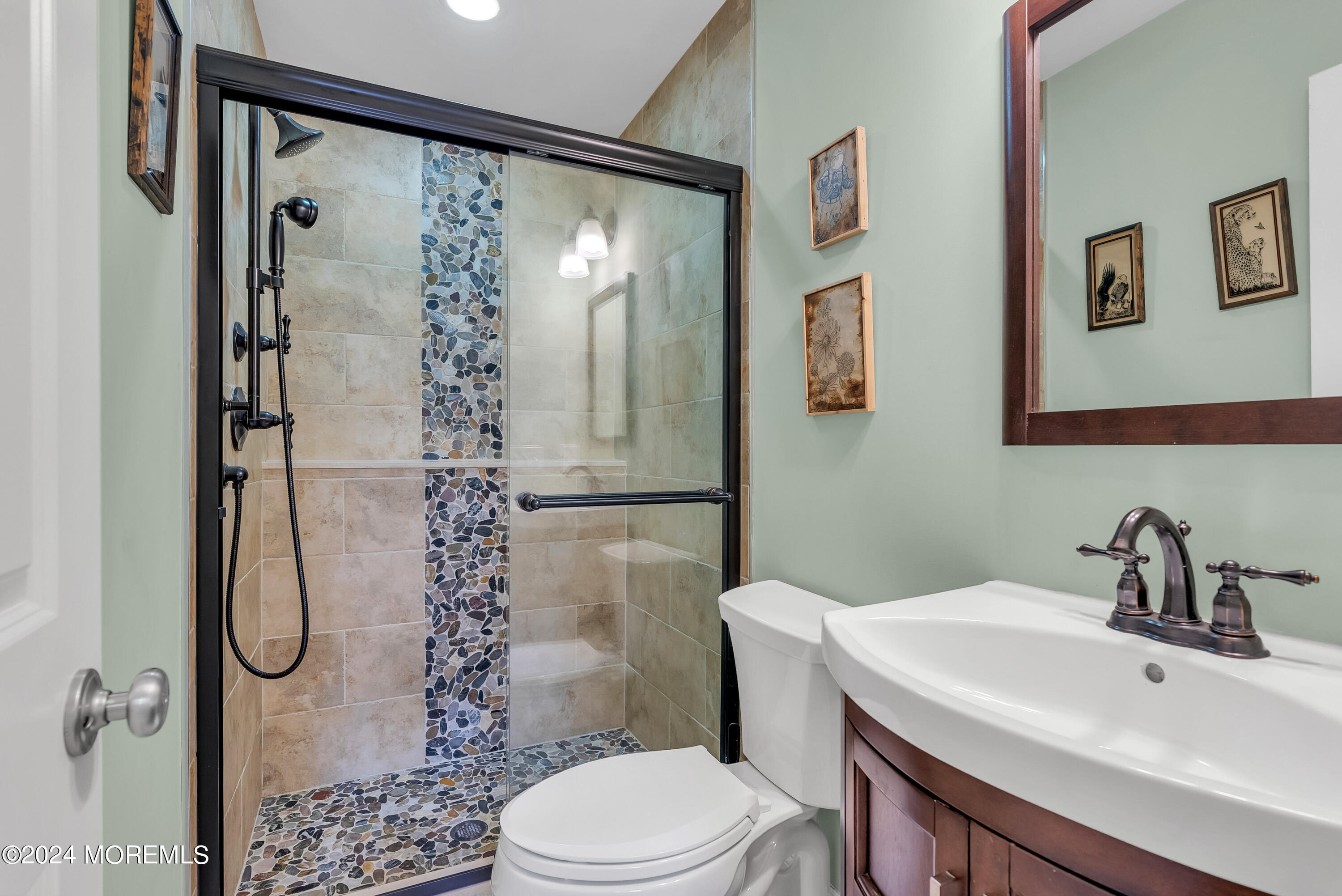 877 Hyson Road Jackson, NJ 08527 - Photo 23 of 35 a bathroom with a sink toilet and shower