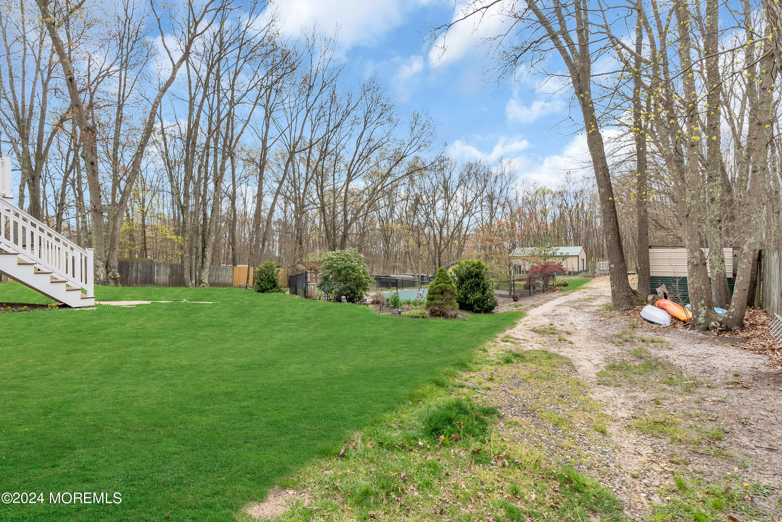 877 Hyson Road Jackson, NJ 08527 - Photo 27 of 35 a view of a yard with large trees