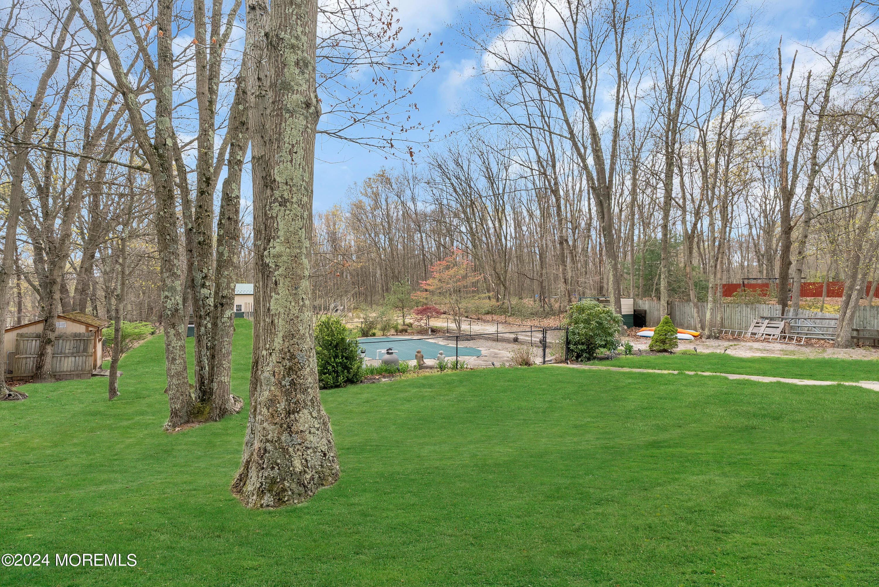 877 Hyson Road Jackson, NJ 08527 - Photo 28 of 35 a view of a backyard with large trees