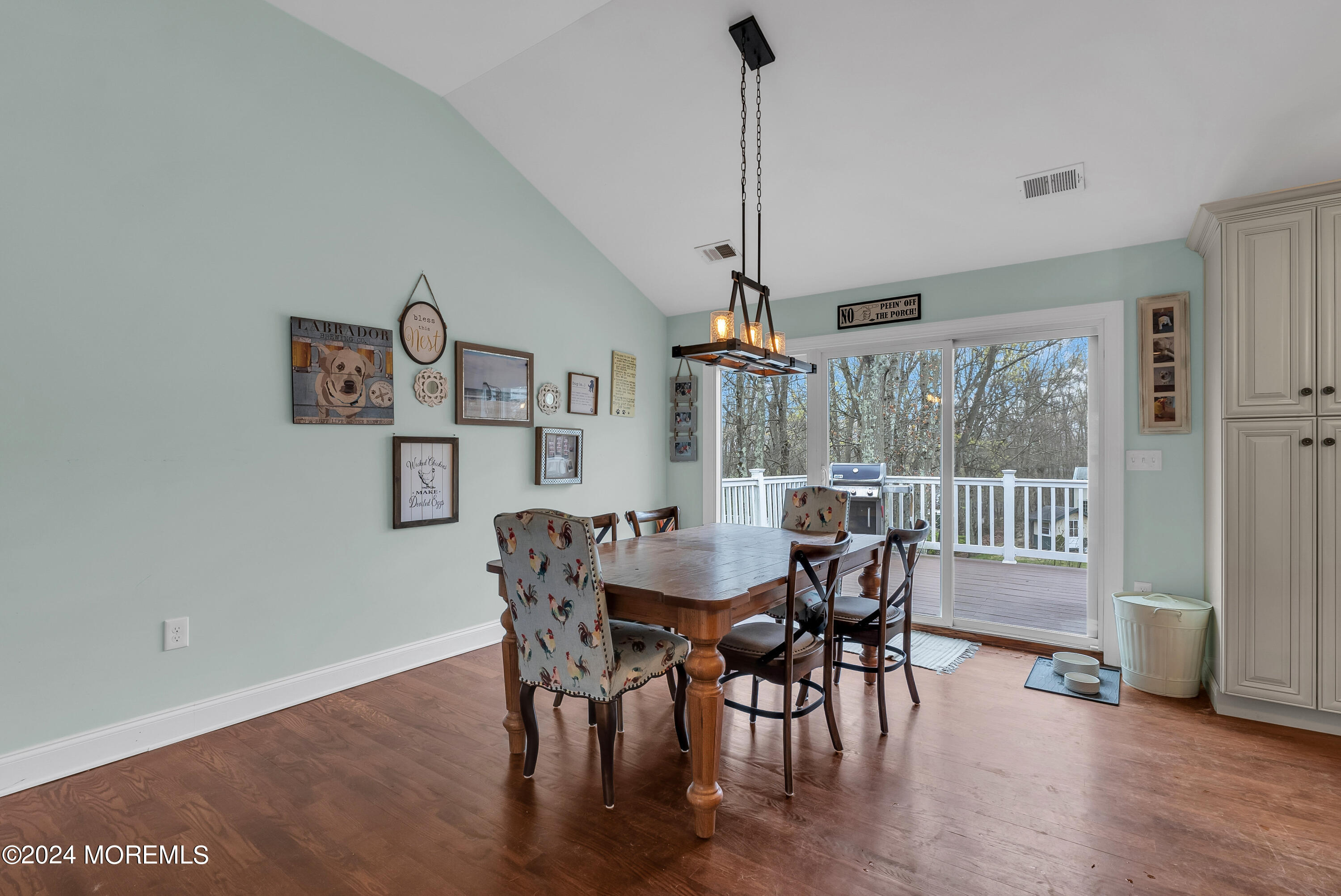 877 Hyson Road Jackson, NJ 08527 - Photo 8 of 35 a view of a dining room with furniture window and wooden floor