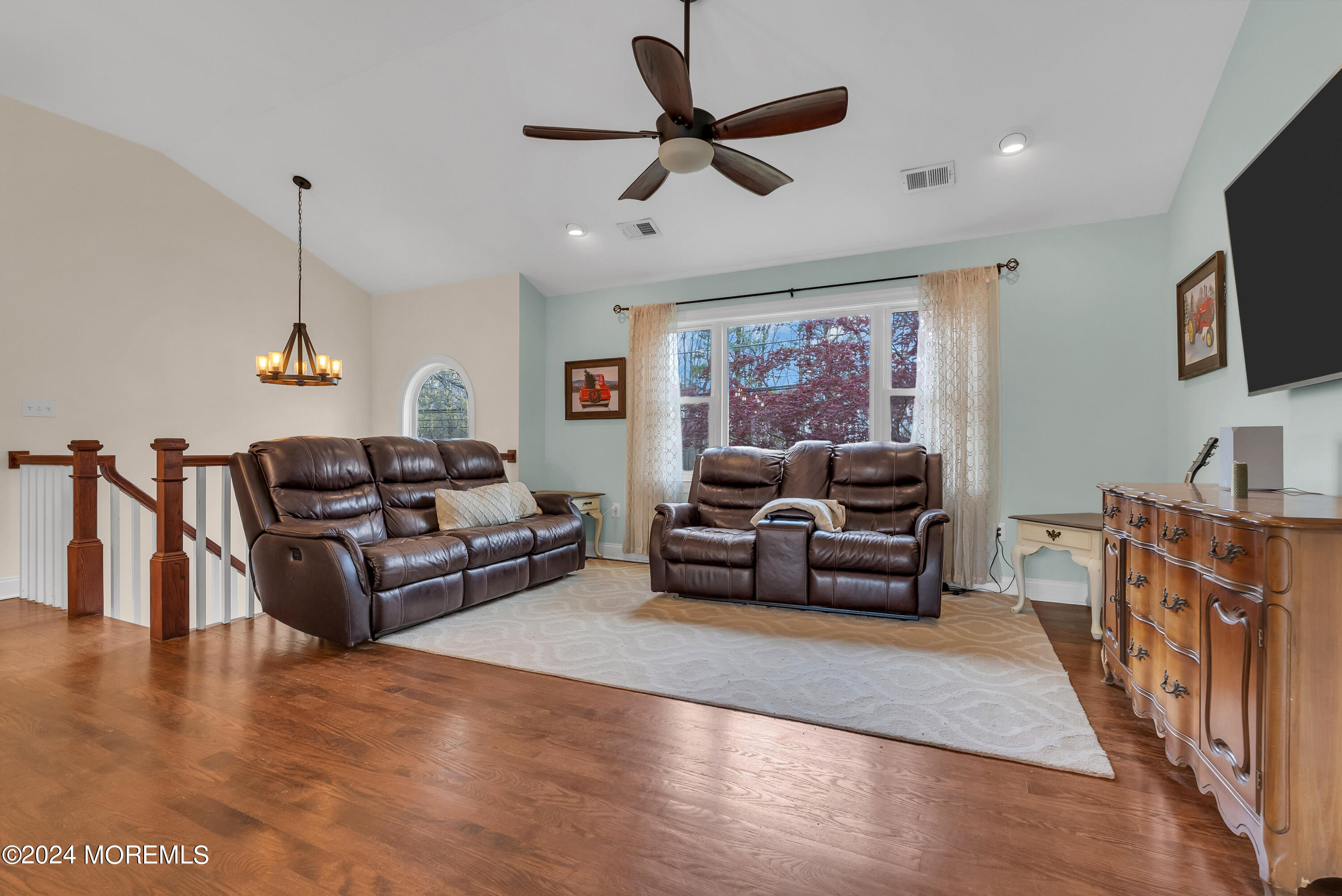 877 Hyson Road Jackson, NJ 08527 - Photo 9 of 35 a living room with furniture and a flat screen tv