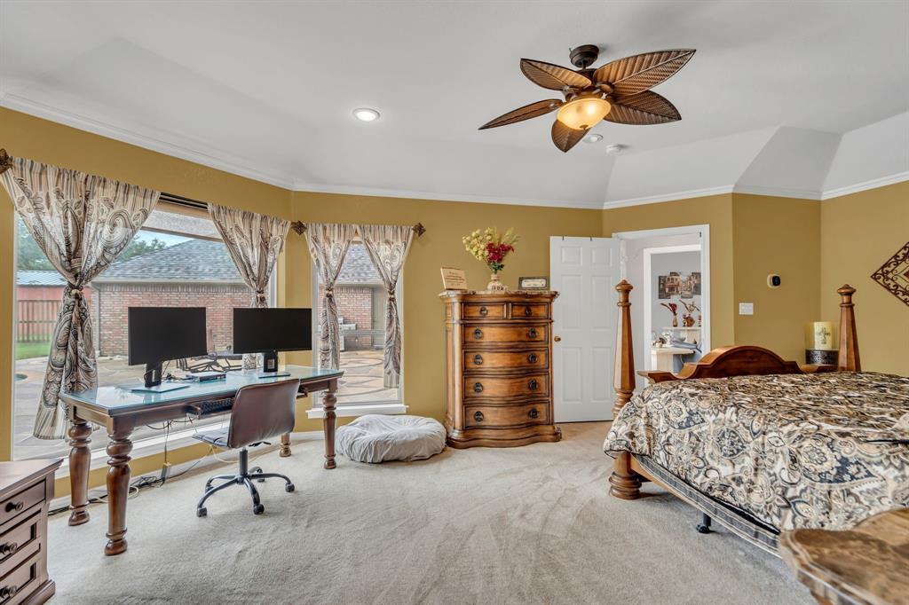 50 Buckingham Lane Allen, TX 75002 - Photo 26 of 39 Carpeted bedroom with a desk, access to outside, ornamental molding, vaulted ceiling, and recessed lighting