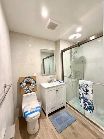 a bathroom with a sink a toilet and a bathtub