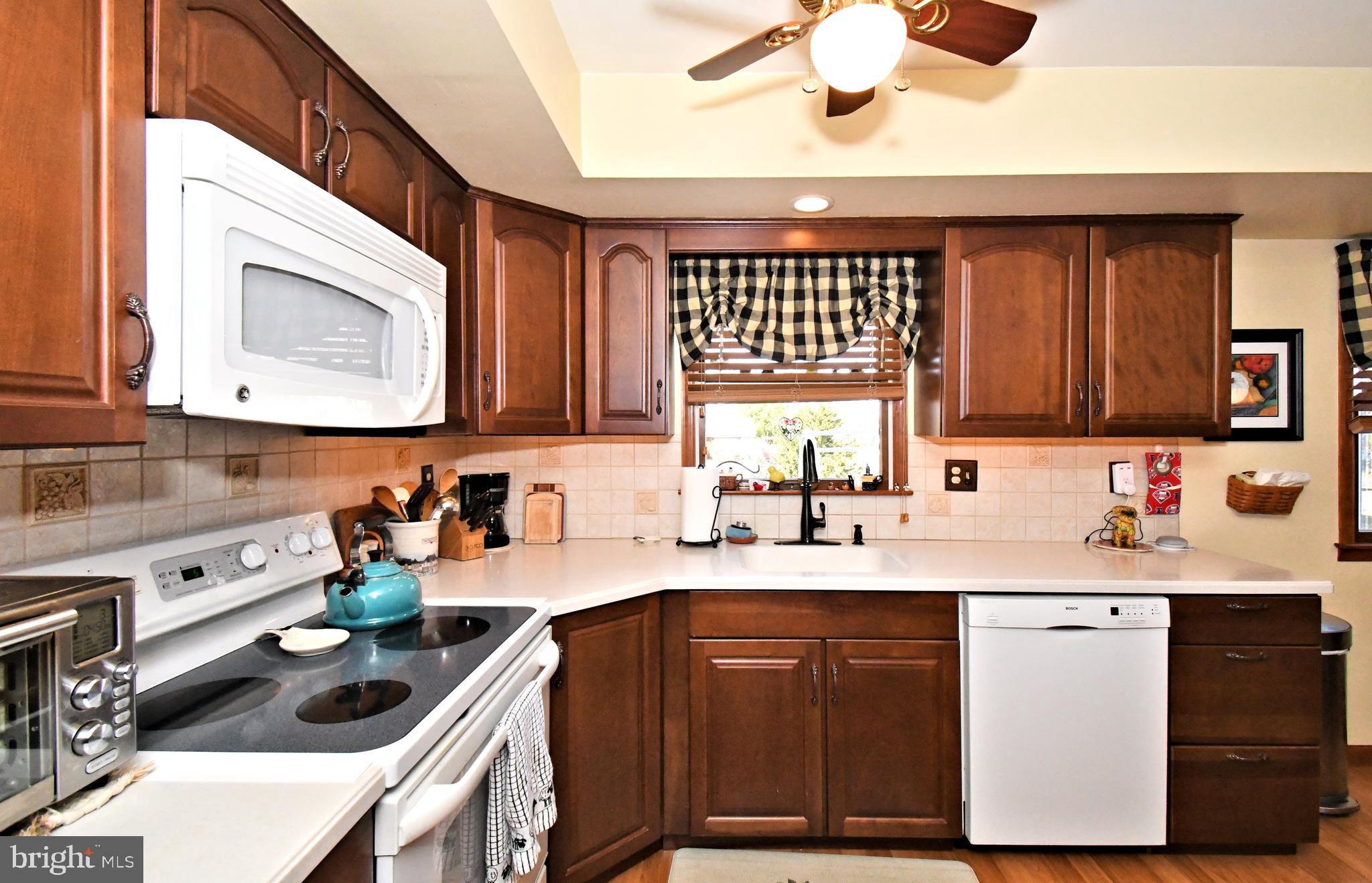 700 Alexander Drive Hatfield, PA 19440 - Photo 15 of 57 a kitchen with a sink cabinets and window