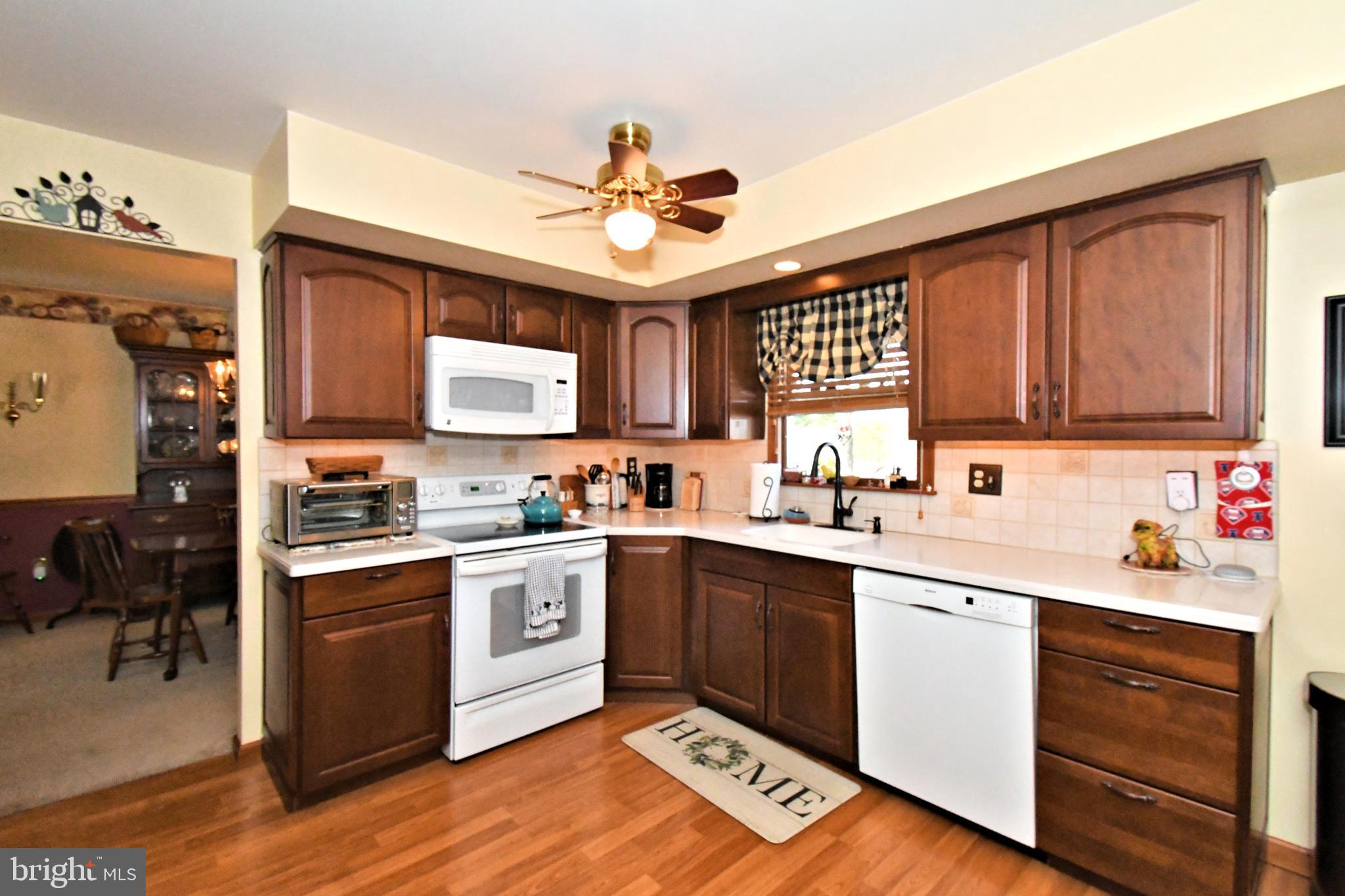 700 Alexander Drive Hatfield, PA 19440 - Photo 16 of 57 a kitchen with a sink cabinets stainless steel appliances and a window