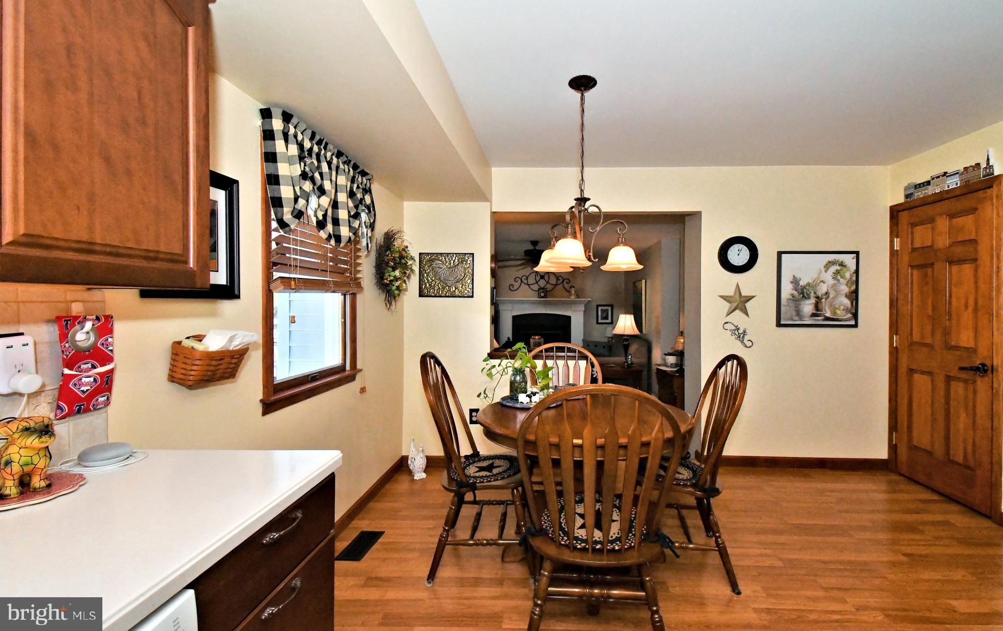 700 Alexander Drive Hatfield, PA 19440 - Photo 19 of 57 a view of a dining room with furniture and wooden floor