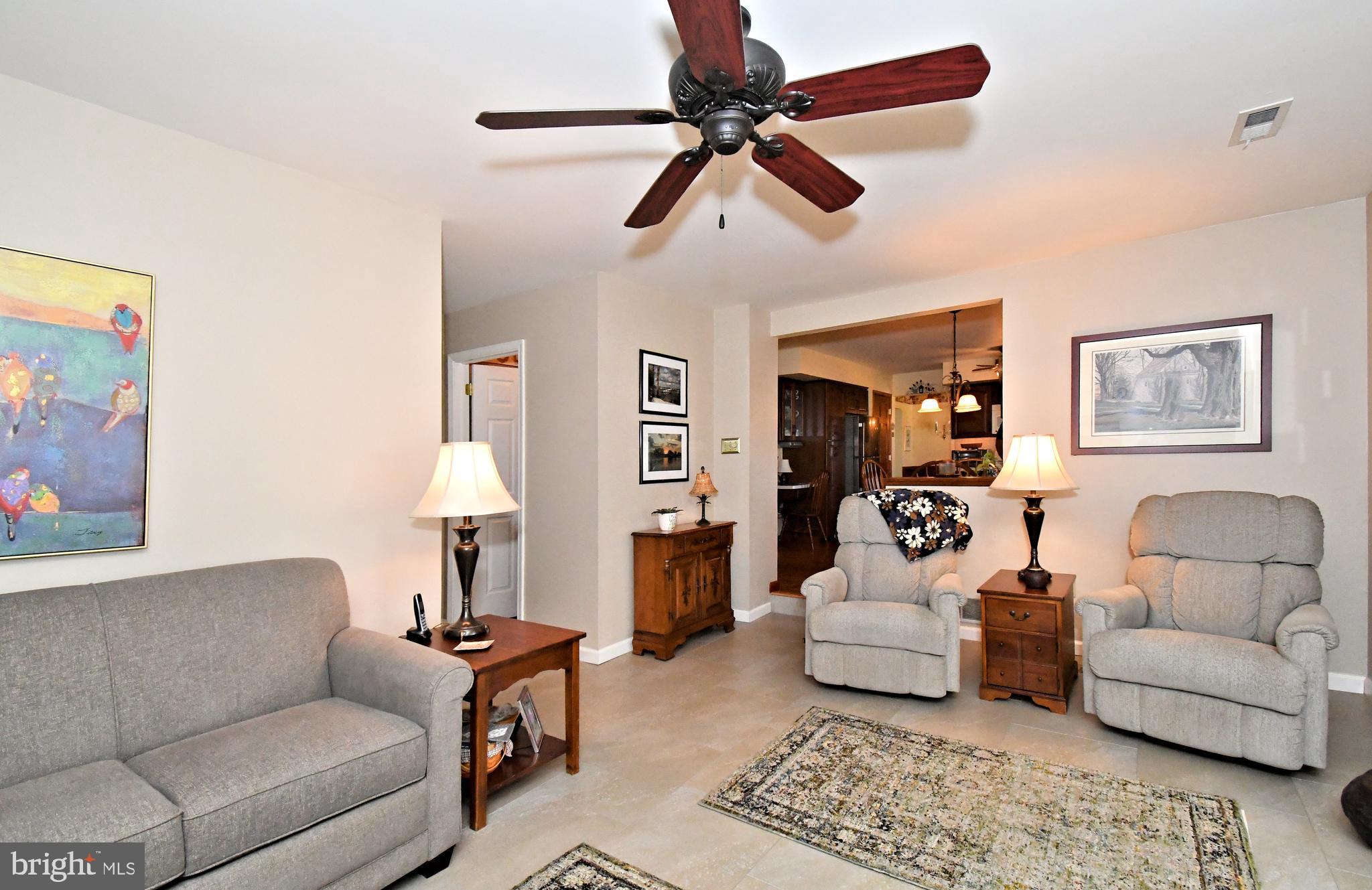 700 Alexander Drive Hatfield, PA 19440 - Photo 26 of 57 a living room with furniture and a rug