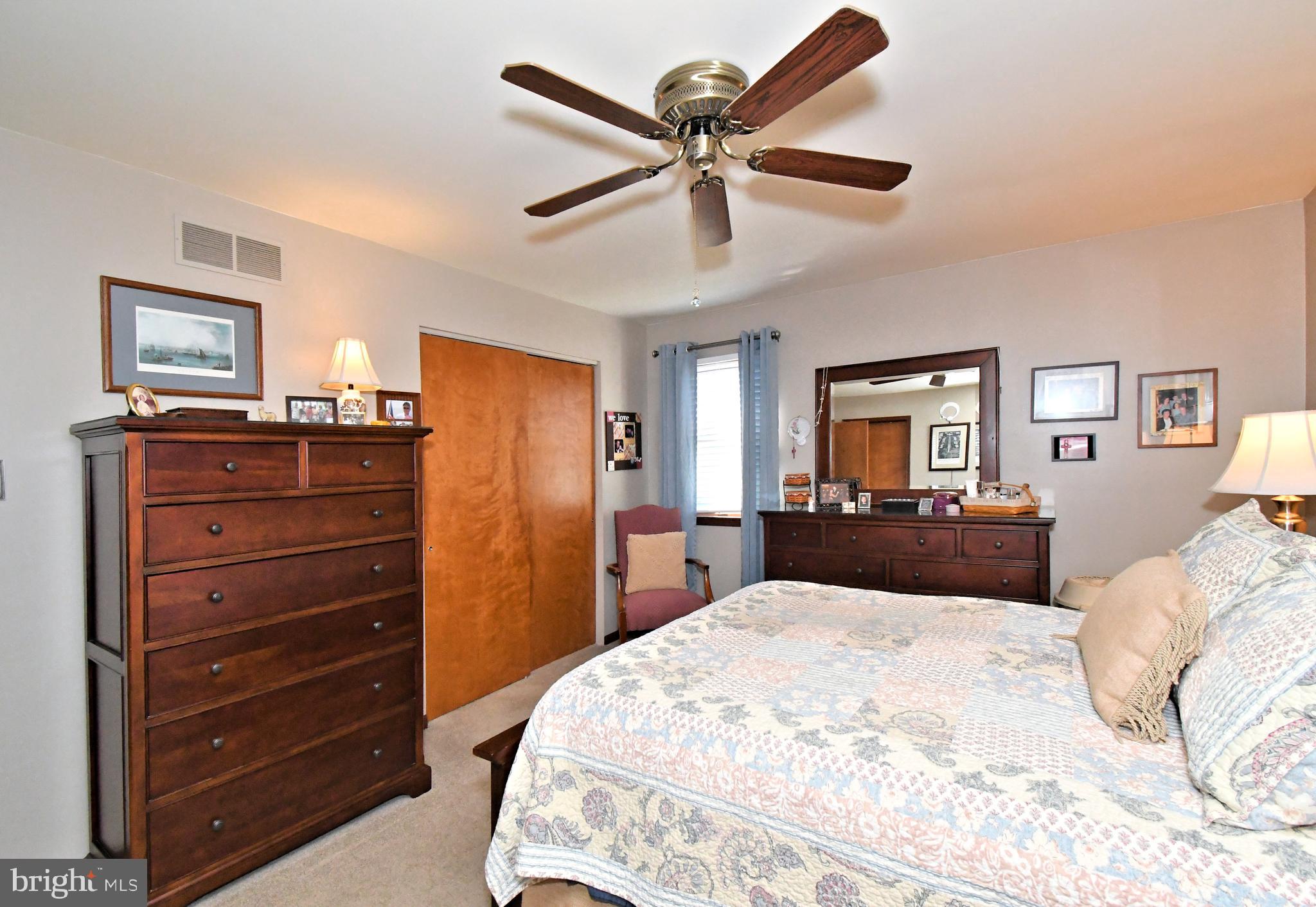 700 Alexander Drive Hatfield, PA 19440 - Photo 32 of 57 a bedroom with a bed and a dresser