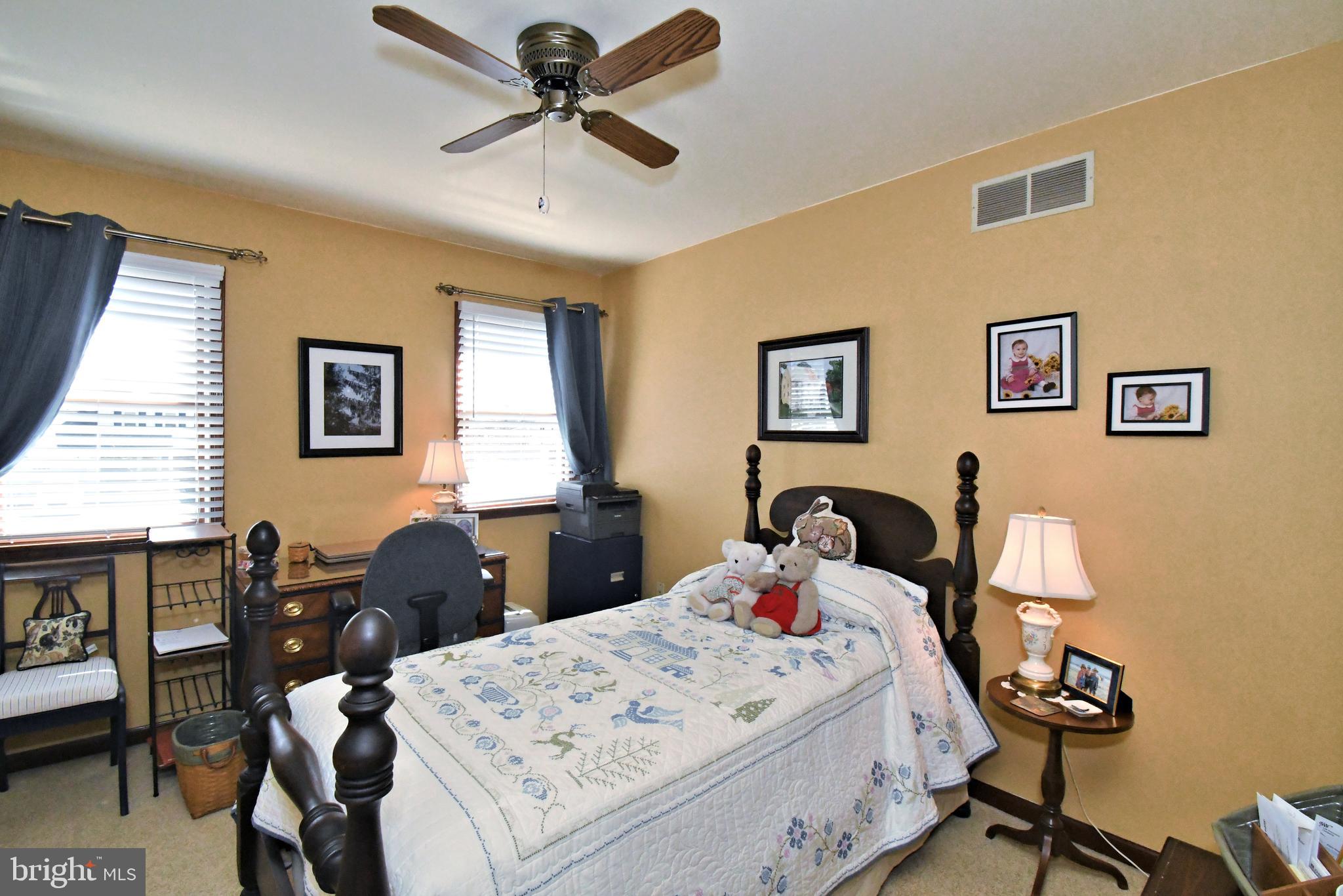 700 Alexander Drive Hatfield, PA 19440 - Photo 34 of 57 a bedroom that has a bed and a table in it