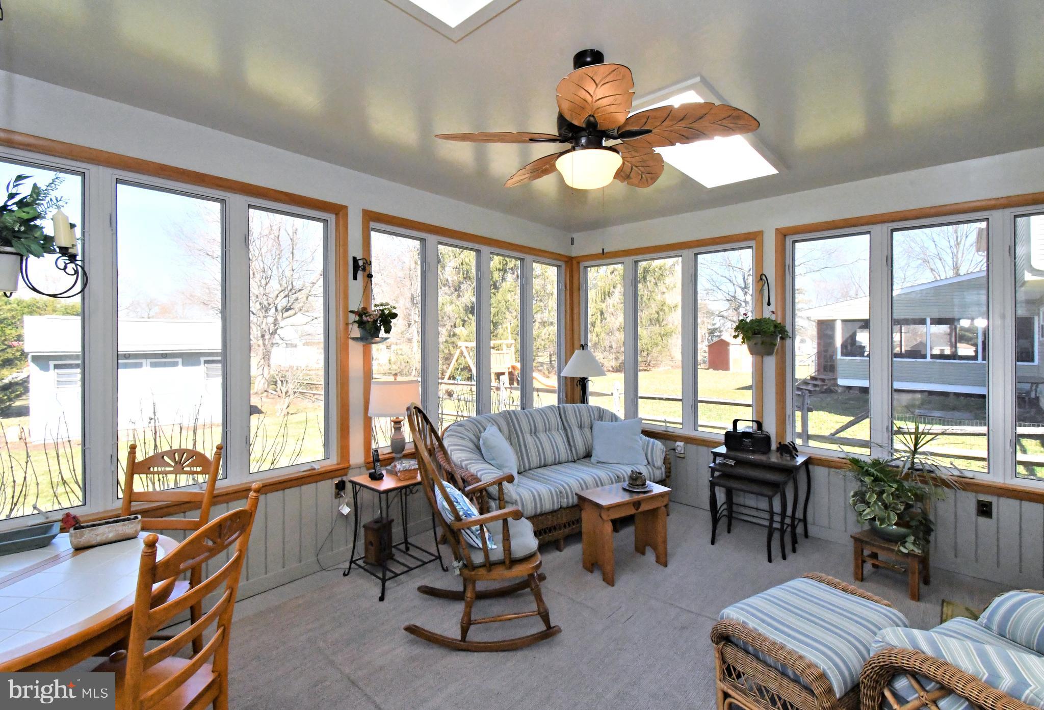 700 Alexander Drive Hatfield, PA 19440 - Photo 40 of 57 a living room with furniture and a large window