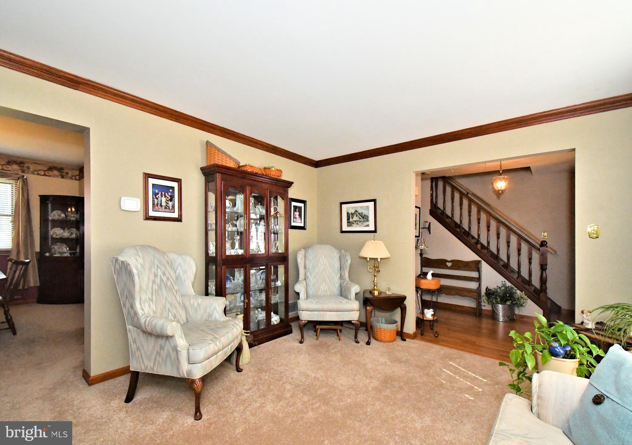 700 Alexander Drive Hatfield, PA 19440 - Photo 10 of 57 a living room with furniture and stairs
