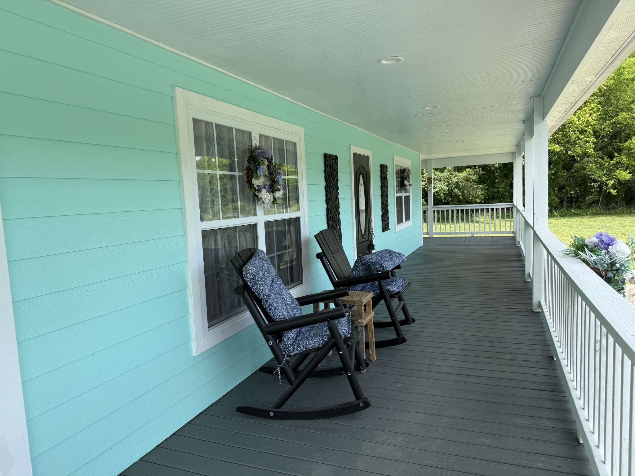 581 Shady Grove Road Bloomington Springs, TN 38545 - Photo 9 of 42 a view of a porch with furniture and garden