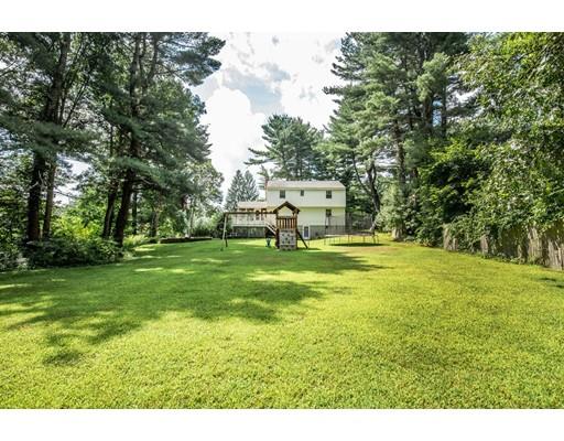 4 Donna Road Andover, MA 01810 - Photo 18 of 19 a backyard of a house with lots of green space