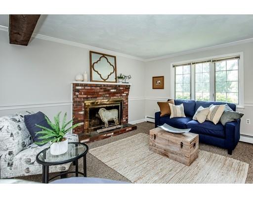 4 Donna Road Andover, MA 01810 - Photo 5 of 19 a living room with furniture a window and a fireplace