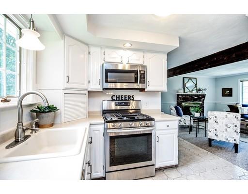 4 Donna Road Andover, MA 01810 - Photo 6 of 19 a kitchen with a stove a sink and a microwave