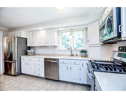 4 Donna Road Andover, MA 01810 - Photo 8 of 19 a kitchen with stainless steel appliances a stove a sink and a refrigerator