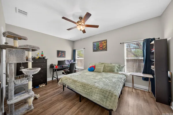 a bedroom with a bed furniture and a window