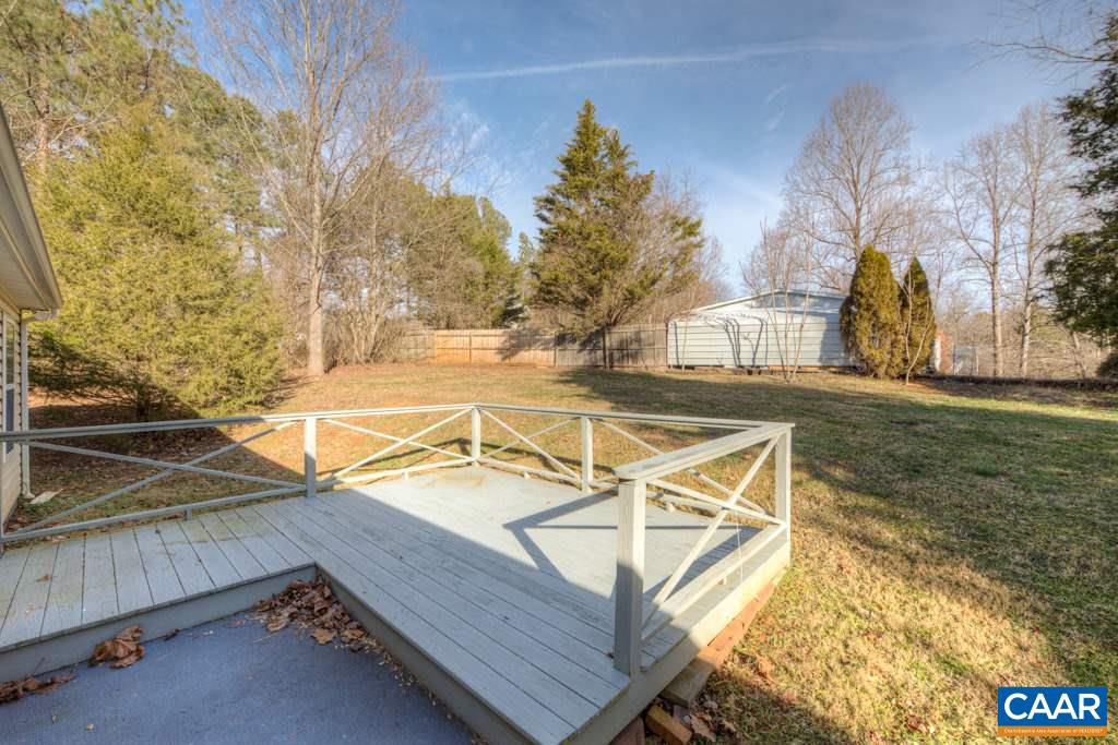 296 Morning Glory Road Ruckersville, VA 22968 - Photo 3 of 27 a view of a backyard with a patio