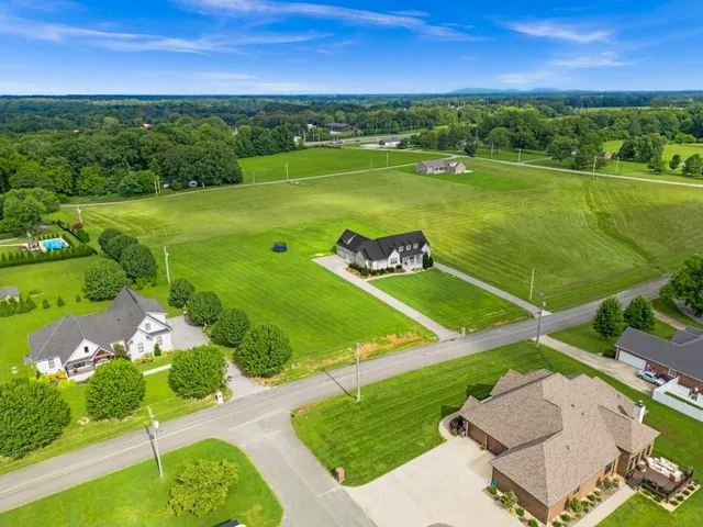 a view of a lake with a big yard