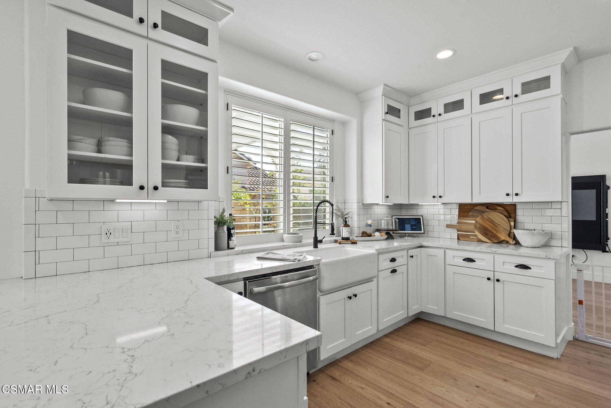 2648 Fallen Leaf Court Simi Valley, CA 93063 - Photo 13 of 42 a kitchen with a sink stove and cabinets