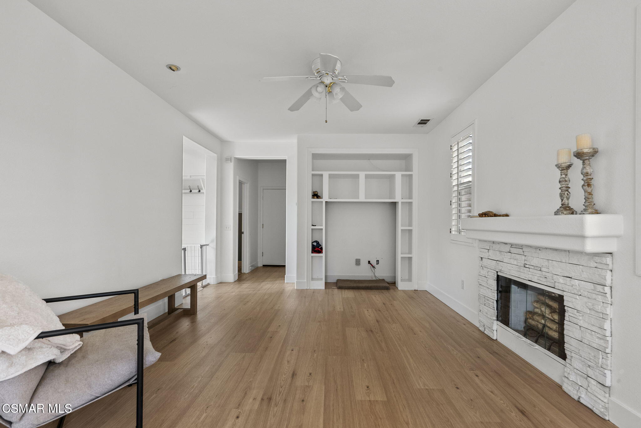 2648 Fallen Leaf Court Simi Valley, CA 93063 - Photo 18 of 42 a view of a room with wooden floor and fireplace