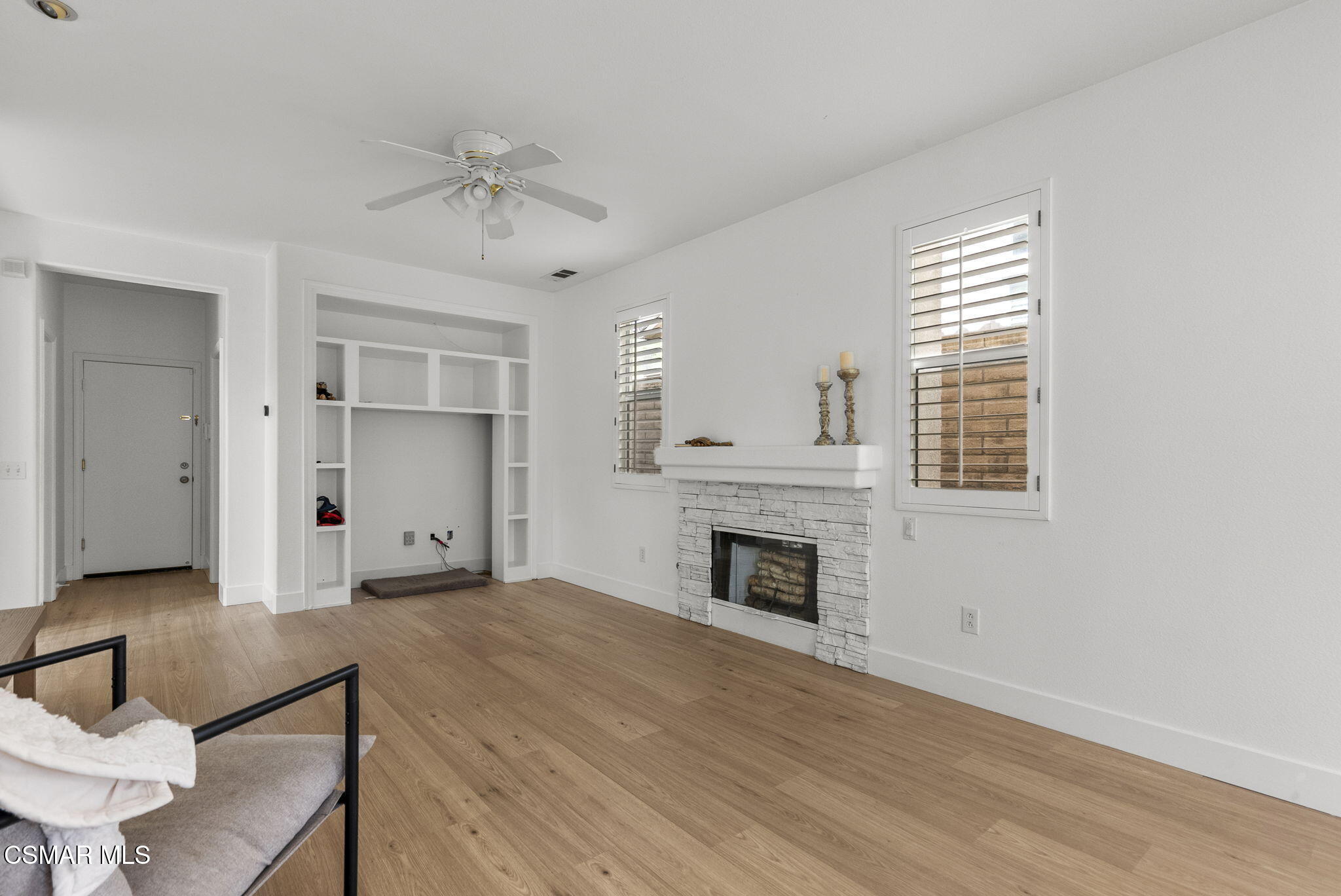 2648 Fallen Leaf Court Simi Valley, CA 93063 - Photo 19 of 42 a view of an empty room with a fireplace and a window