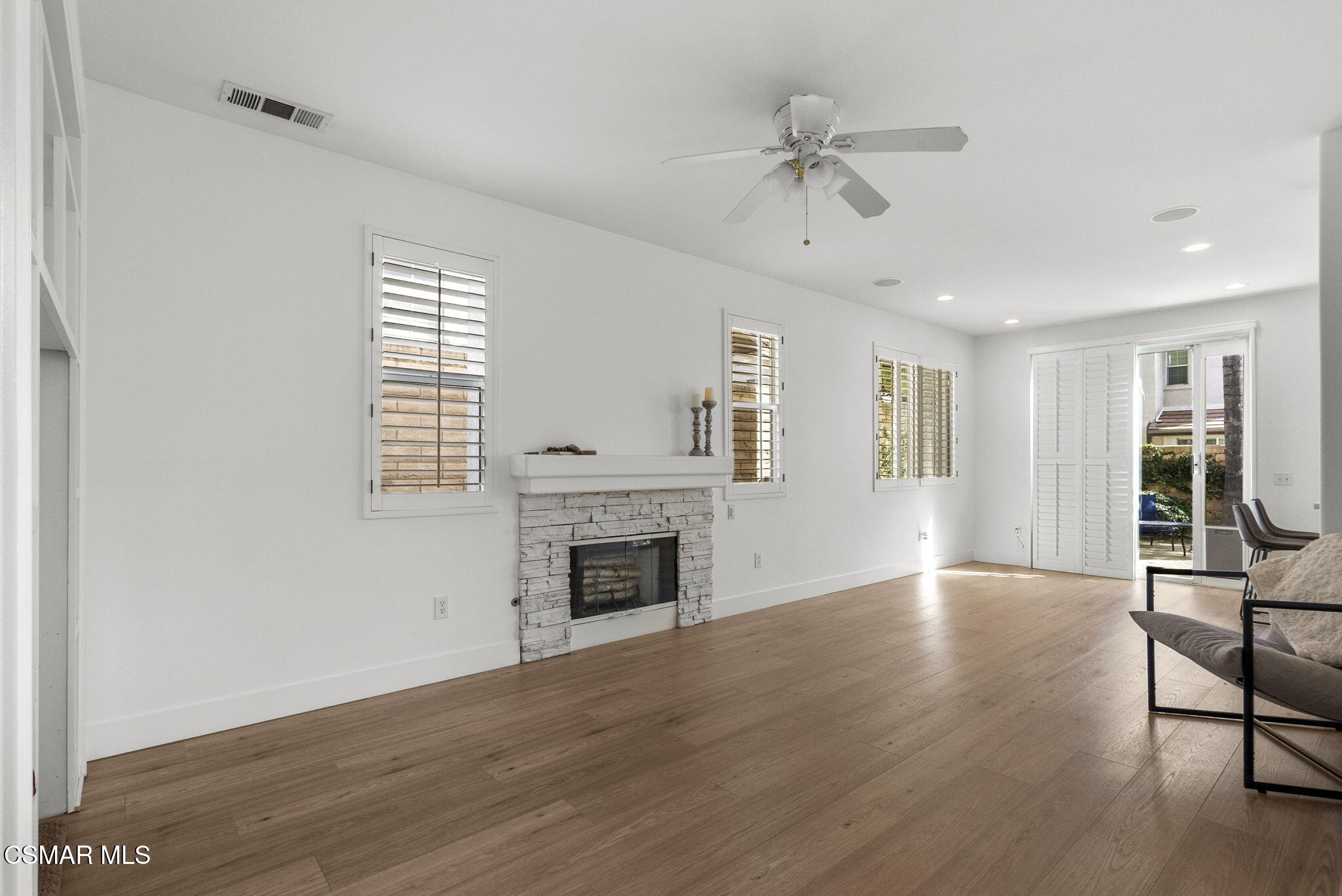 2648 Fallen Leaf Court Simi Valley, CA 93063 - Photo 20 of 42 an empty room with windows and fireplace