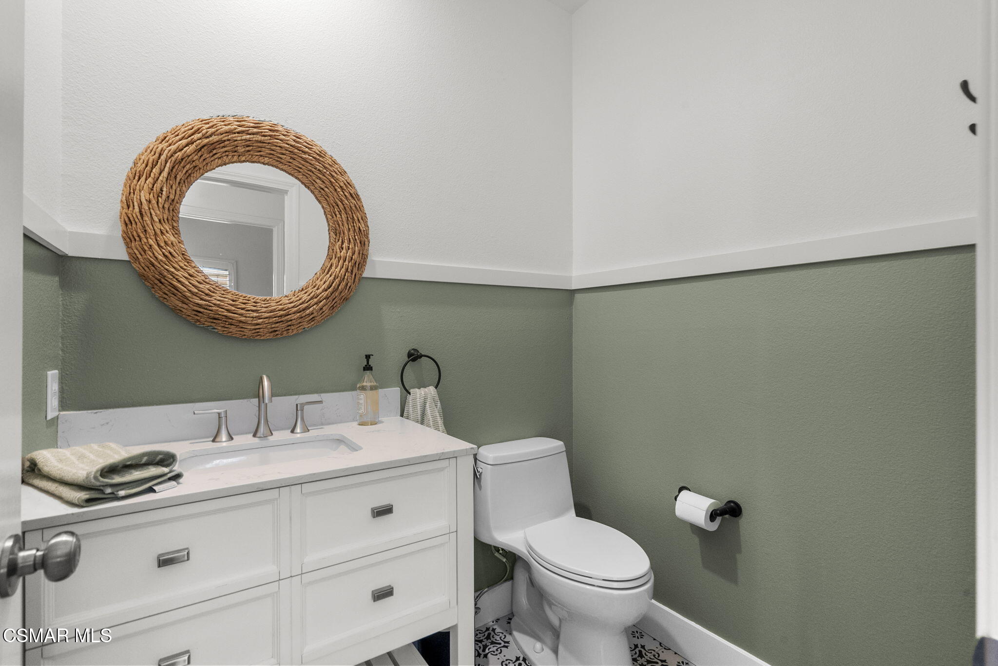 2648 Fallen Leaf Court Simi Valley, CA 93063 - Photo 21 of 42 a bathroom with a toilet a sink and a mirror