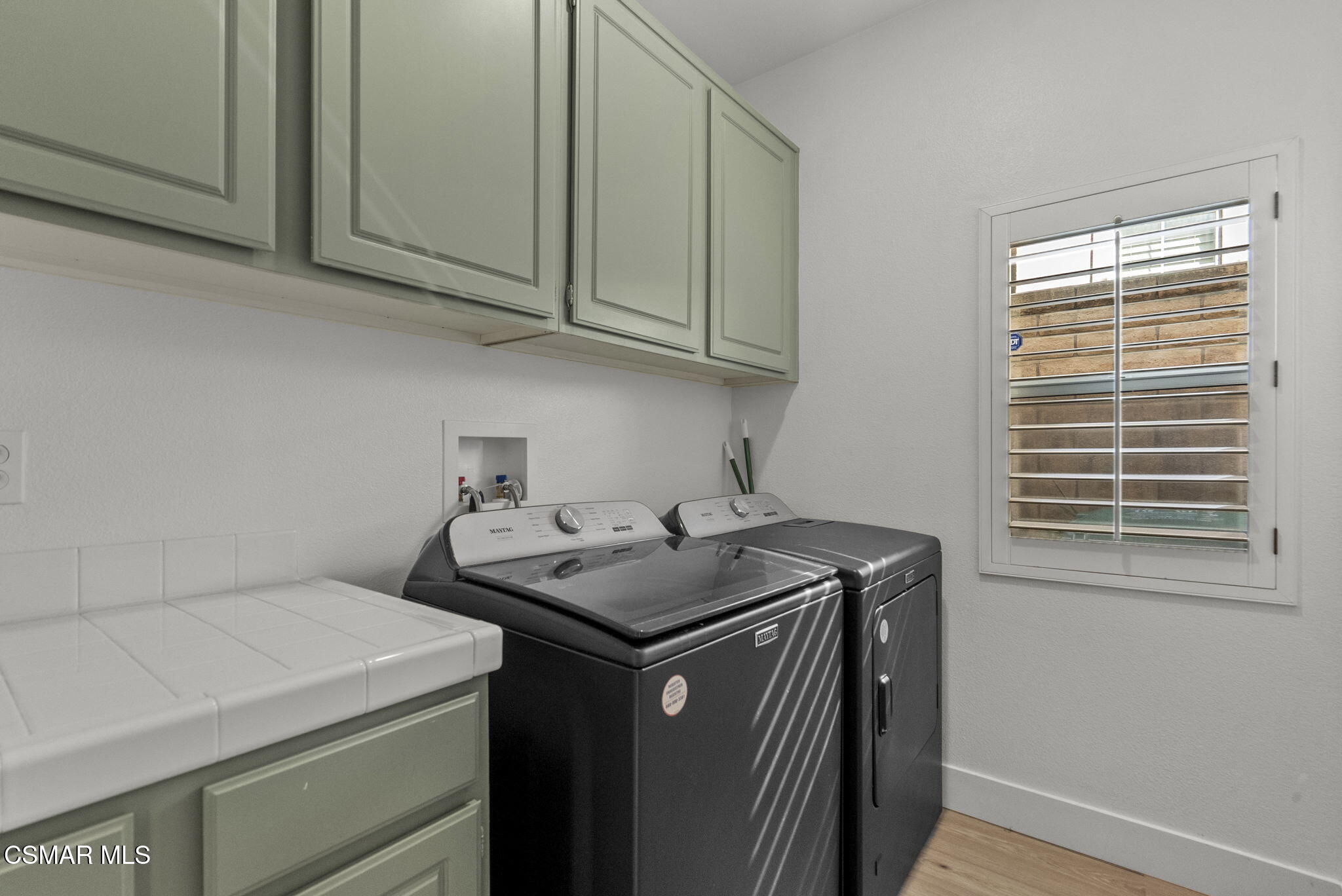 2648 Fallen Leaf Court Simi Valley, CA 93063 - Photo 22 of 42 a utility room with dryer and washer