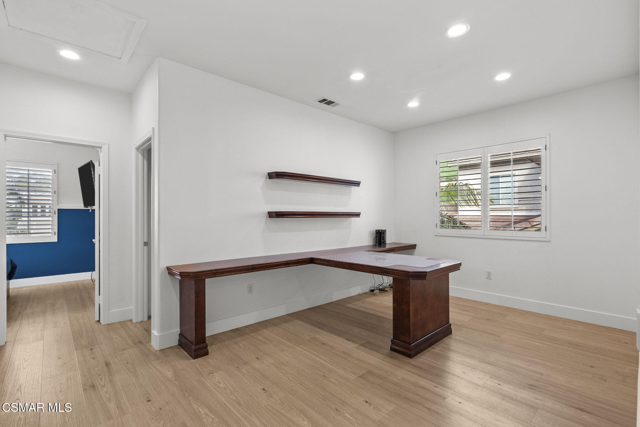 2648 Fallen Leaf Court Simi Valley, CA 93063 - Photo 25 of 42 a room with furniture and a wooden floor
