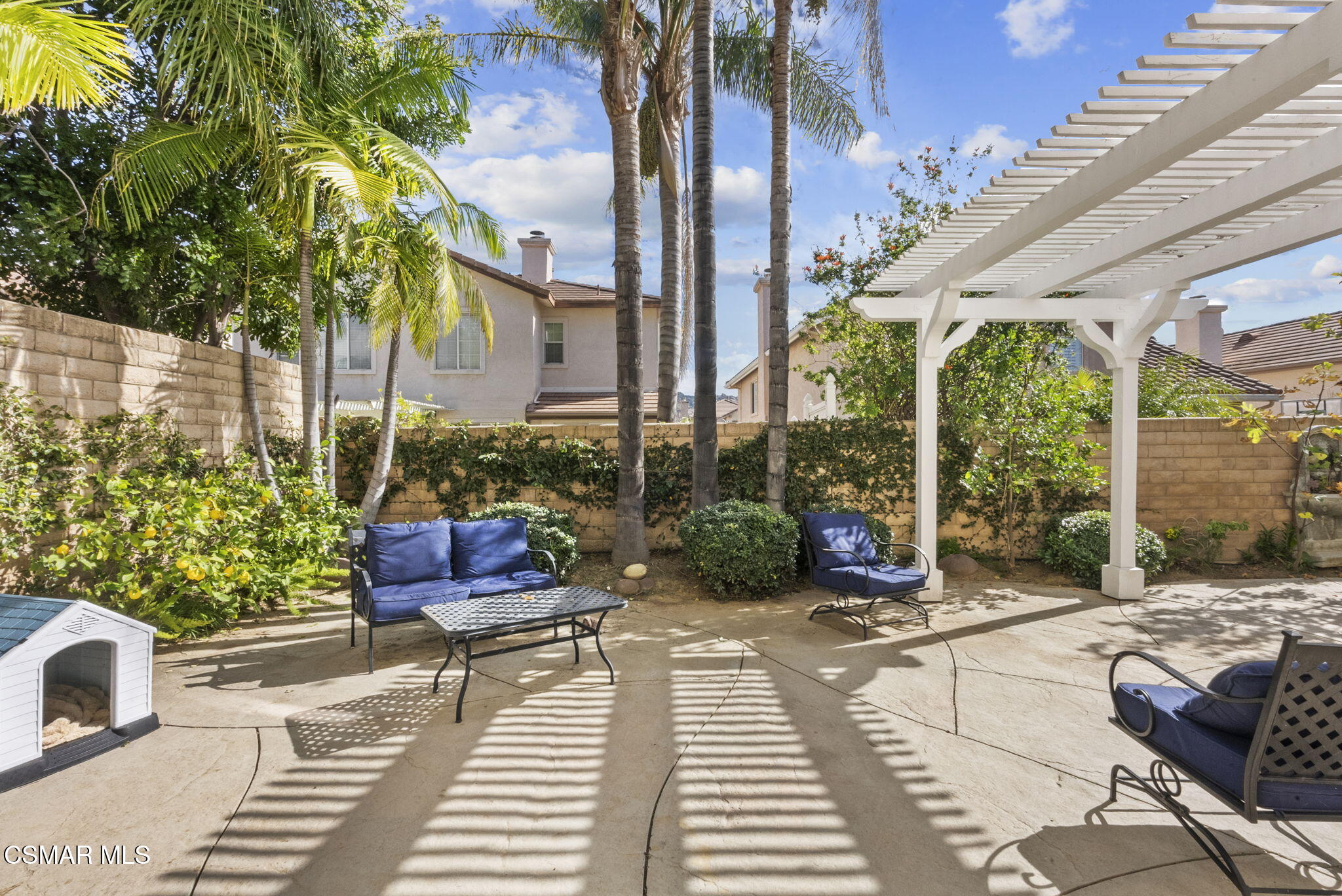 2648 Fallen Leaf Court Simi Valley, CA 93063 - Photo 35 of 42 a view of a patio with couches table and chairs and potted plants