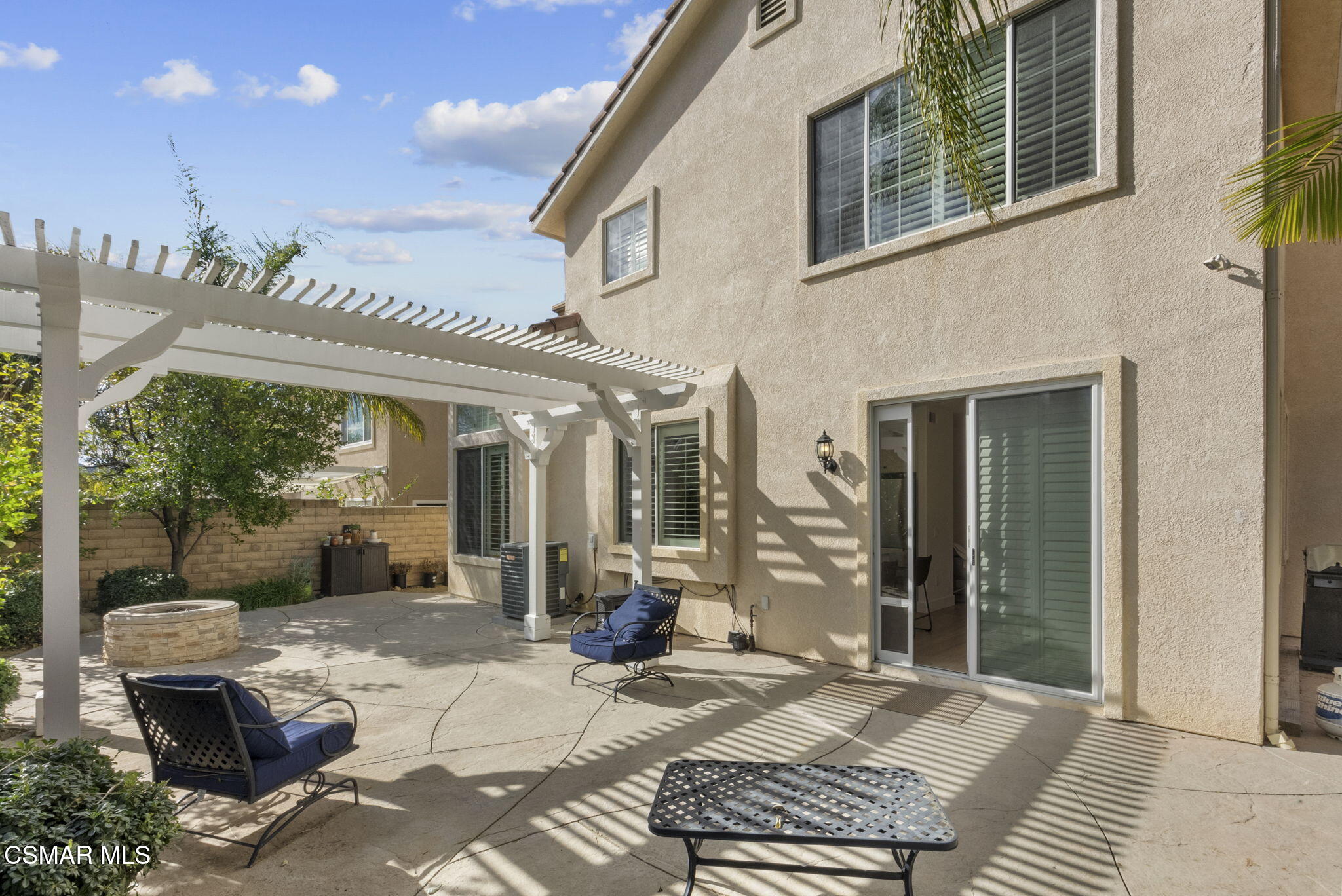 2648 Fallen Leaf Court Simi Valley, CA 93063 - Photo 37 of 42 a view of a patio with a table and chairs