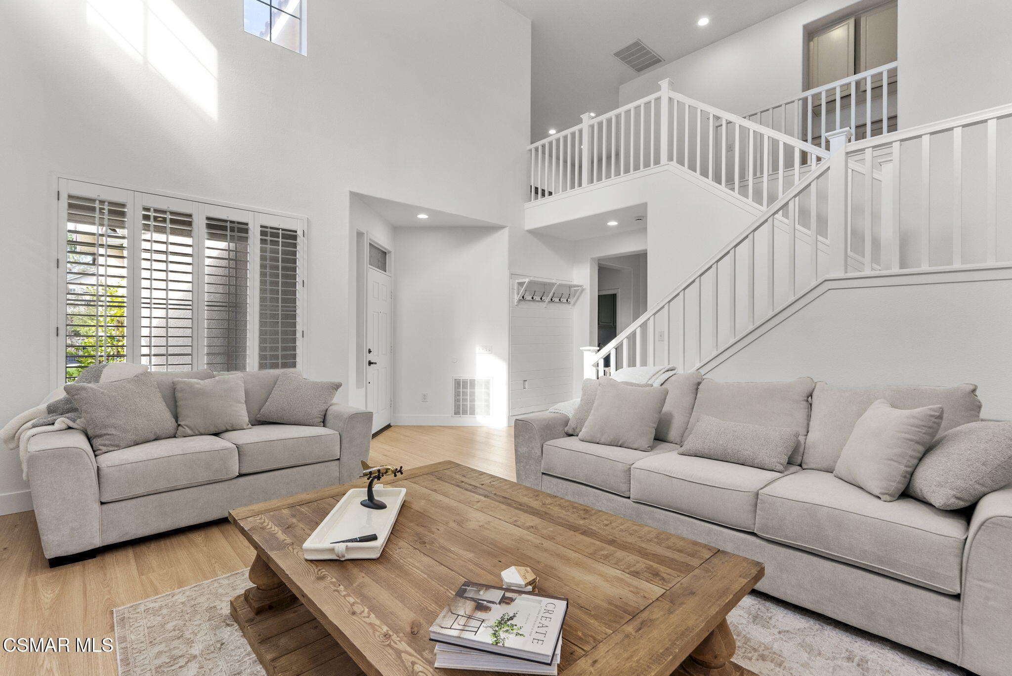 2648 Fallen Leaf Court Simi Valley, CA 93063 - Photo 5 of 42 a living room with furniture and stairs