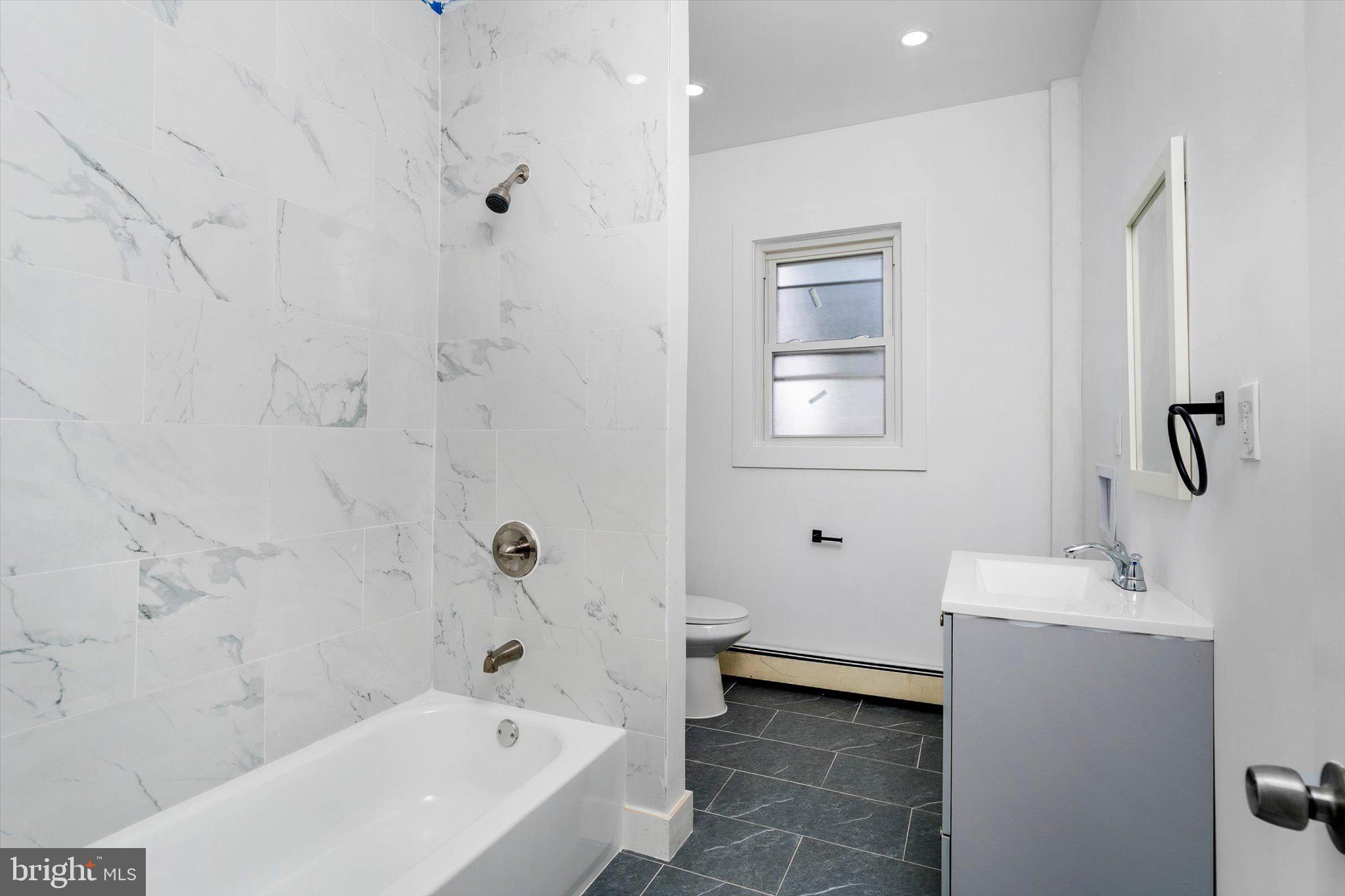10 Lytle Street, Unit 2 Princeton, NJ 08542 - Photo 10 of 16 a bathroom with a bathtub and shower
