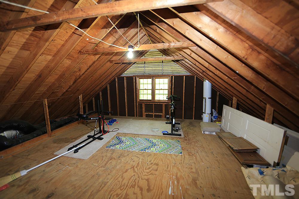 716 Bennington Drive Raleigh, NC 27615 - Photo 16 of 29 a view of a room with gym equipment