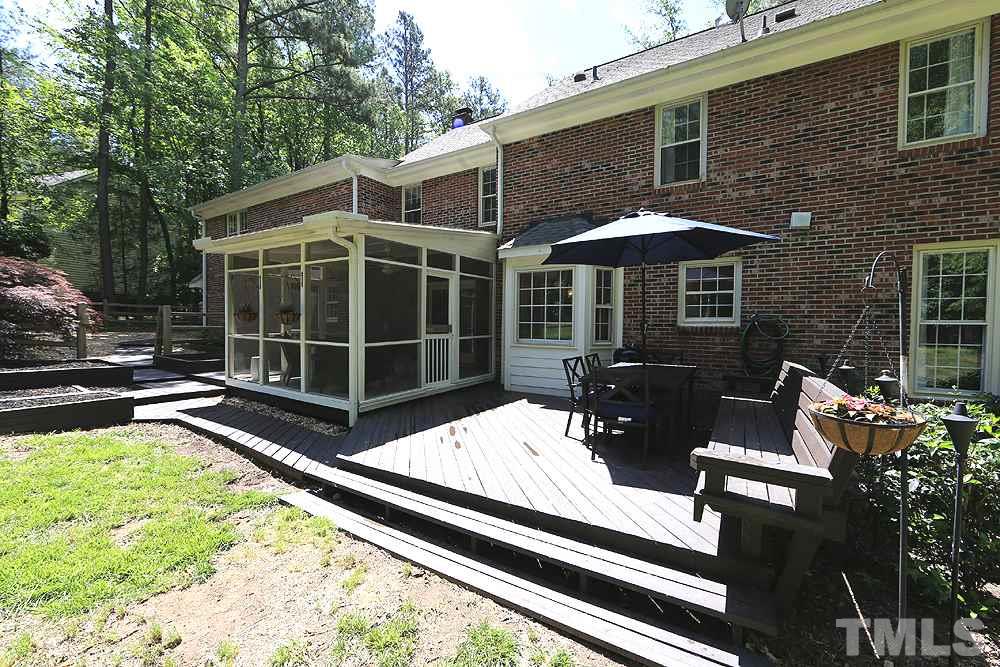716 Bennington Drive Raleigh, NC 27615 - Photo 19 of 29 a view of a chairs and tables in the patio