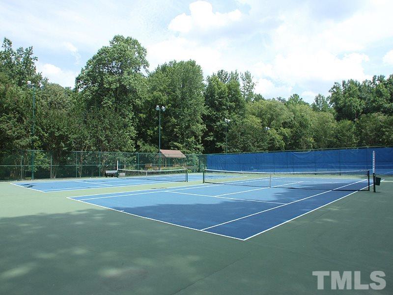 716 Bennington Drive Raleigh, NC 27615 - Photo 26 of 29 a view of an outdoor space and tennis court