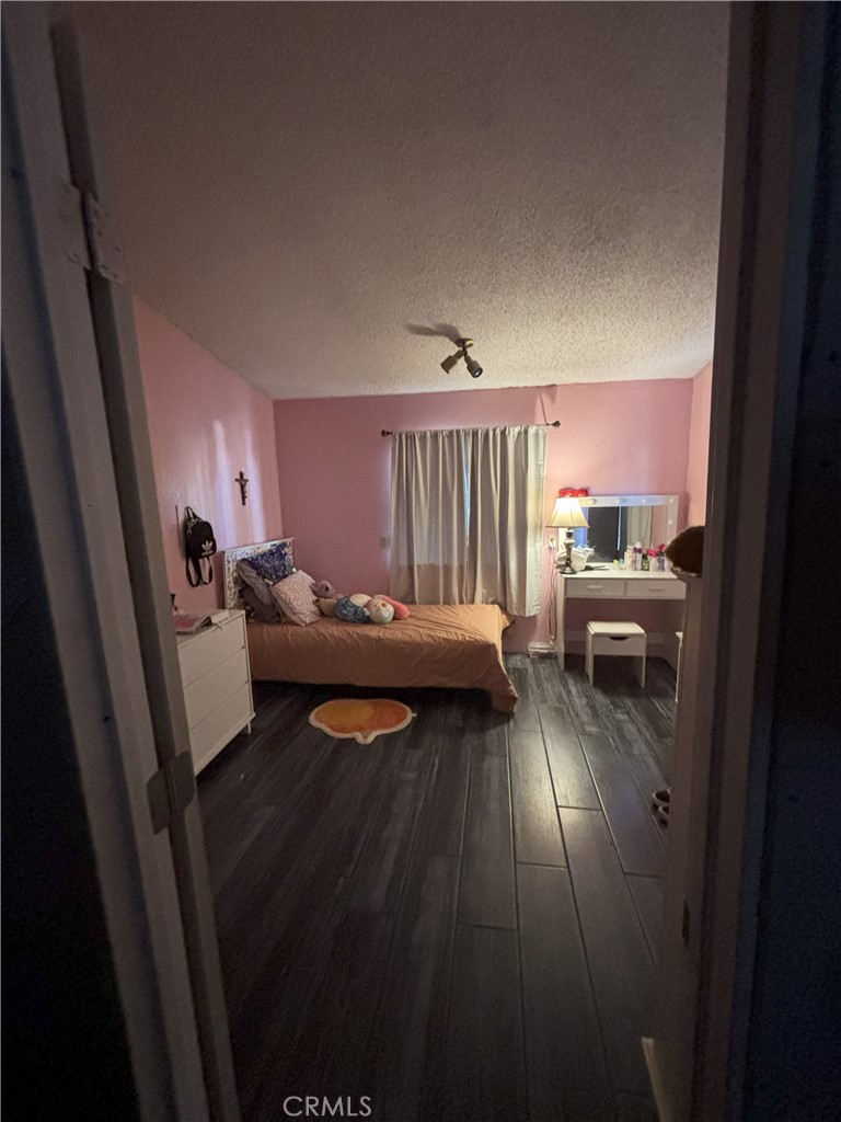 4080 Pedley Road, Unit 2 Jurupa Valley, CA 92509 - Photo 13 of 21 a living room with furniture and a fireplace