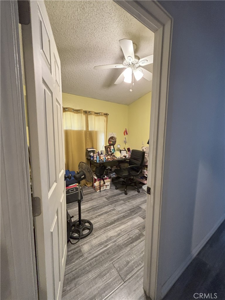 4080 Pedley Road, Unit 2 Jurupa Valley, CA 92509 - Photo 15 of 21 a view of a livingroom with furniture wooden floor and window