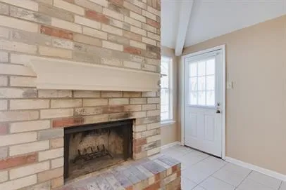 a kitchen with white cabinets and a sink