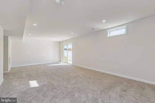 a view of a livingroom and window
