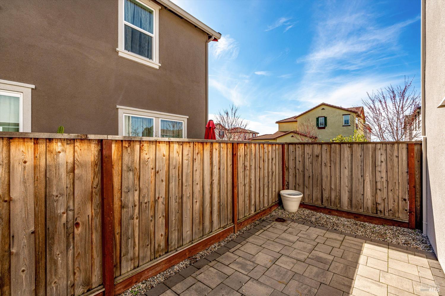 6054 Oxford Place Rohnert Park, CA 94928 - Photo 37 of 44 a view of a wooden fence next to a house