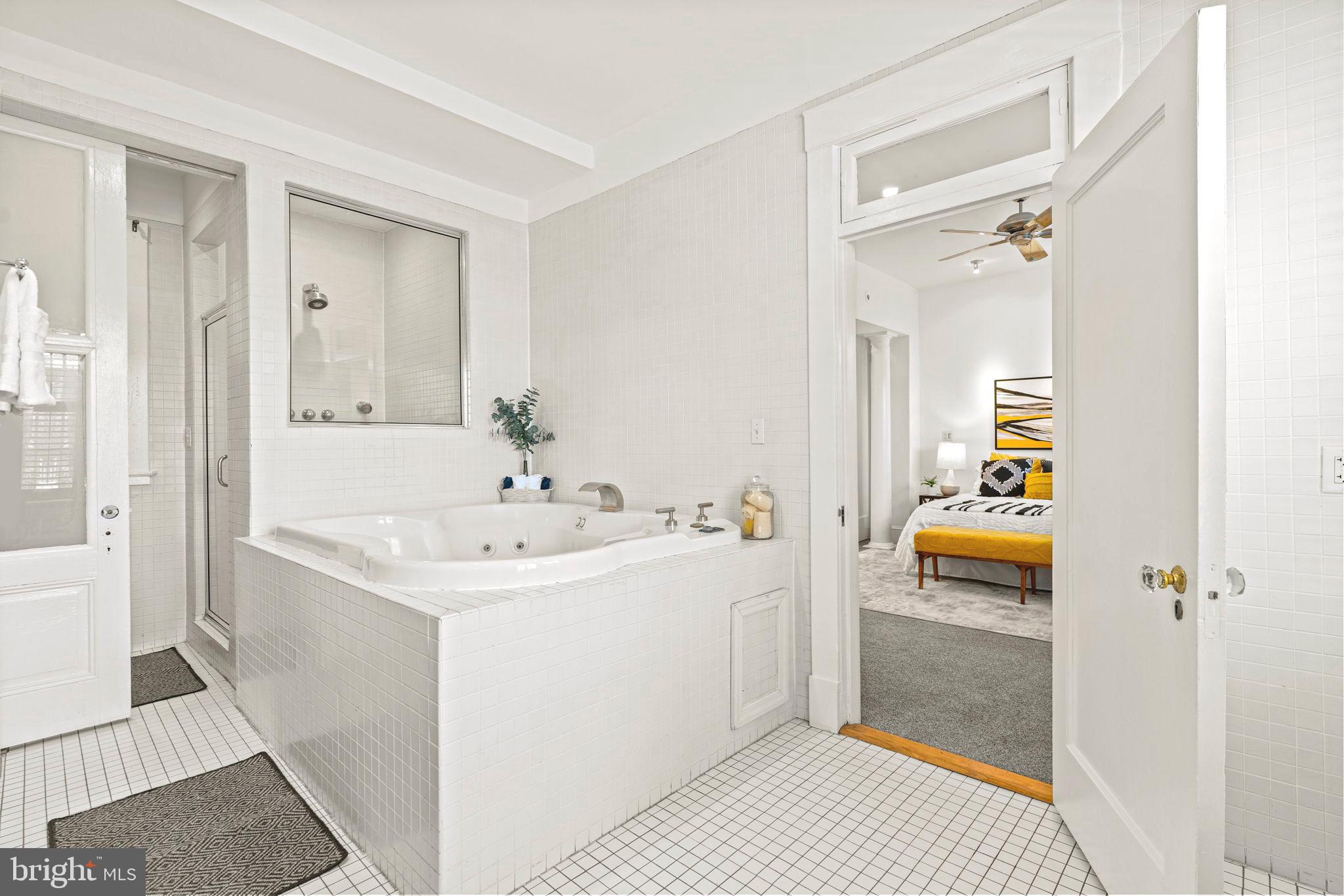 1736 Columbia Road Northwest, Unit 102 Washington, DC 20009 - Photo 18 of 39 a bathroom with a sink a toilet and shower