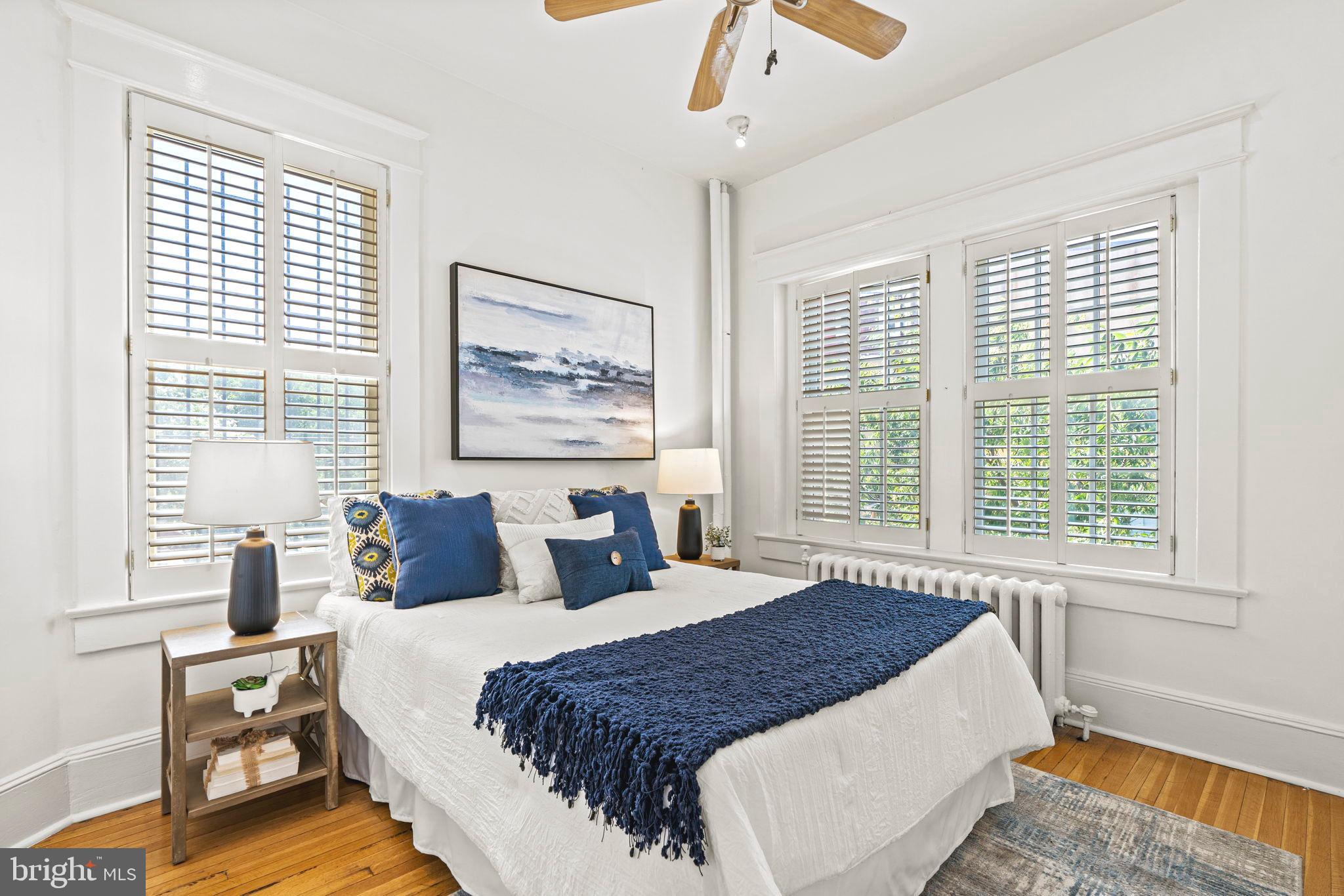 1736 Columbia Road Northwest, Unit 102 Washington, DC 20009 - Photo 25 of 39 a bedroom with bed and a window