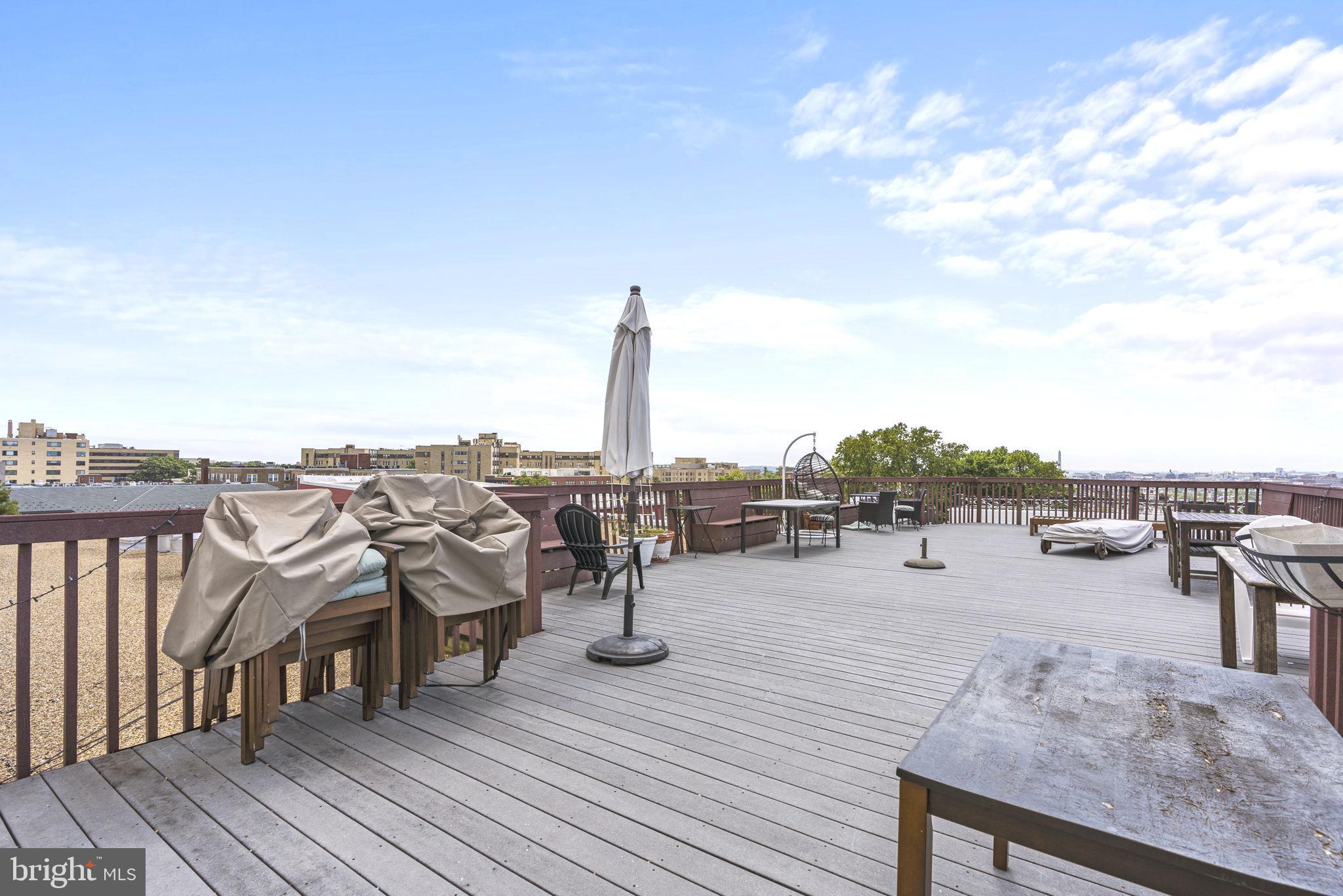 1736 Columbia Road Northwest, Unit 102 Washington, DC 20009 - Photo 29 of 39 a view of a terrace with sitting area