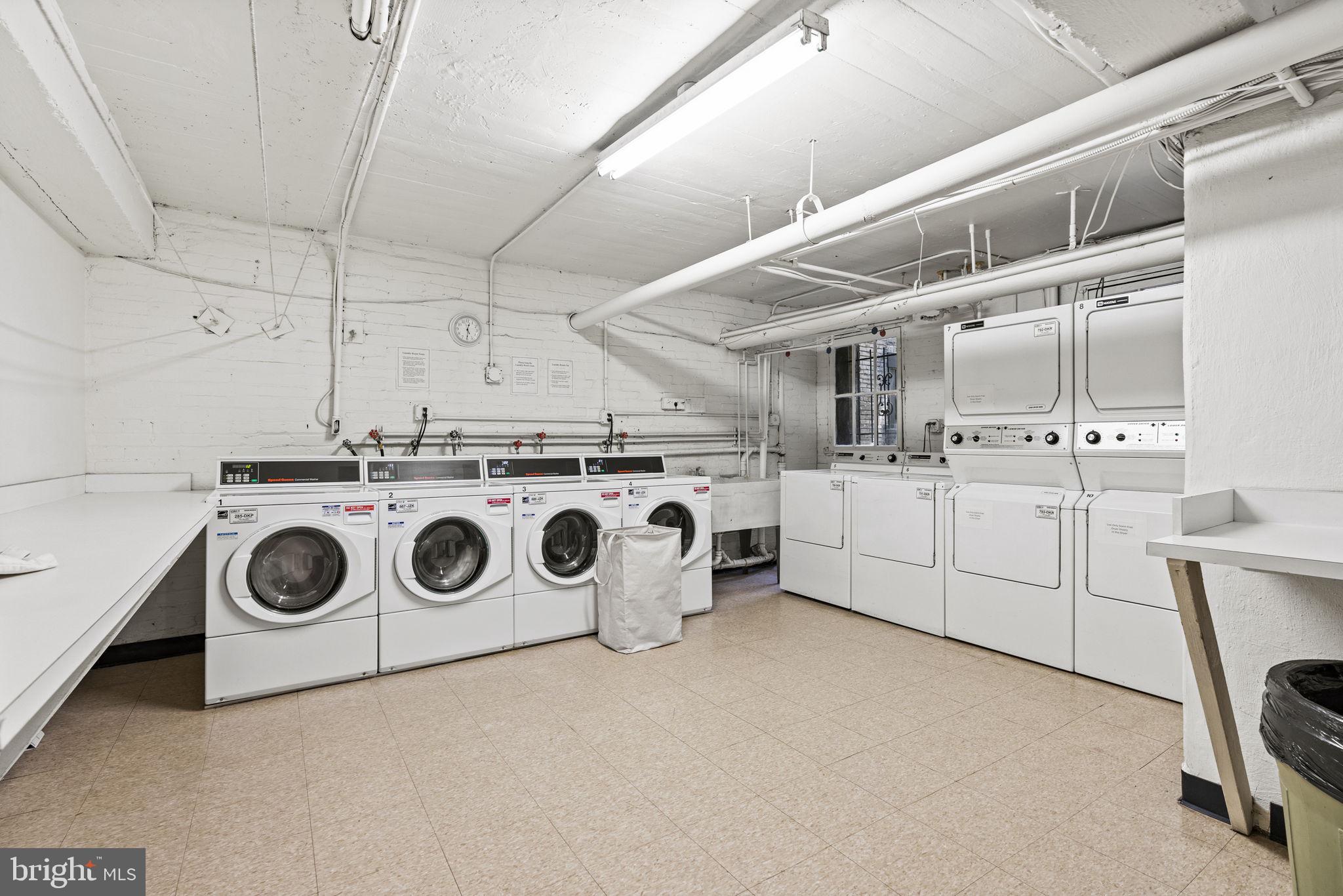 1736 Columbia Road Northwest, Unit 102 Washington, DC 20009 - Photo 31 of 39 a utility room with dryer and washer