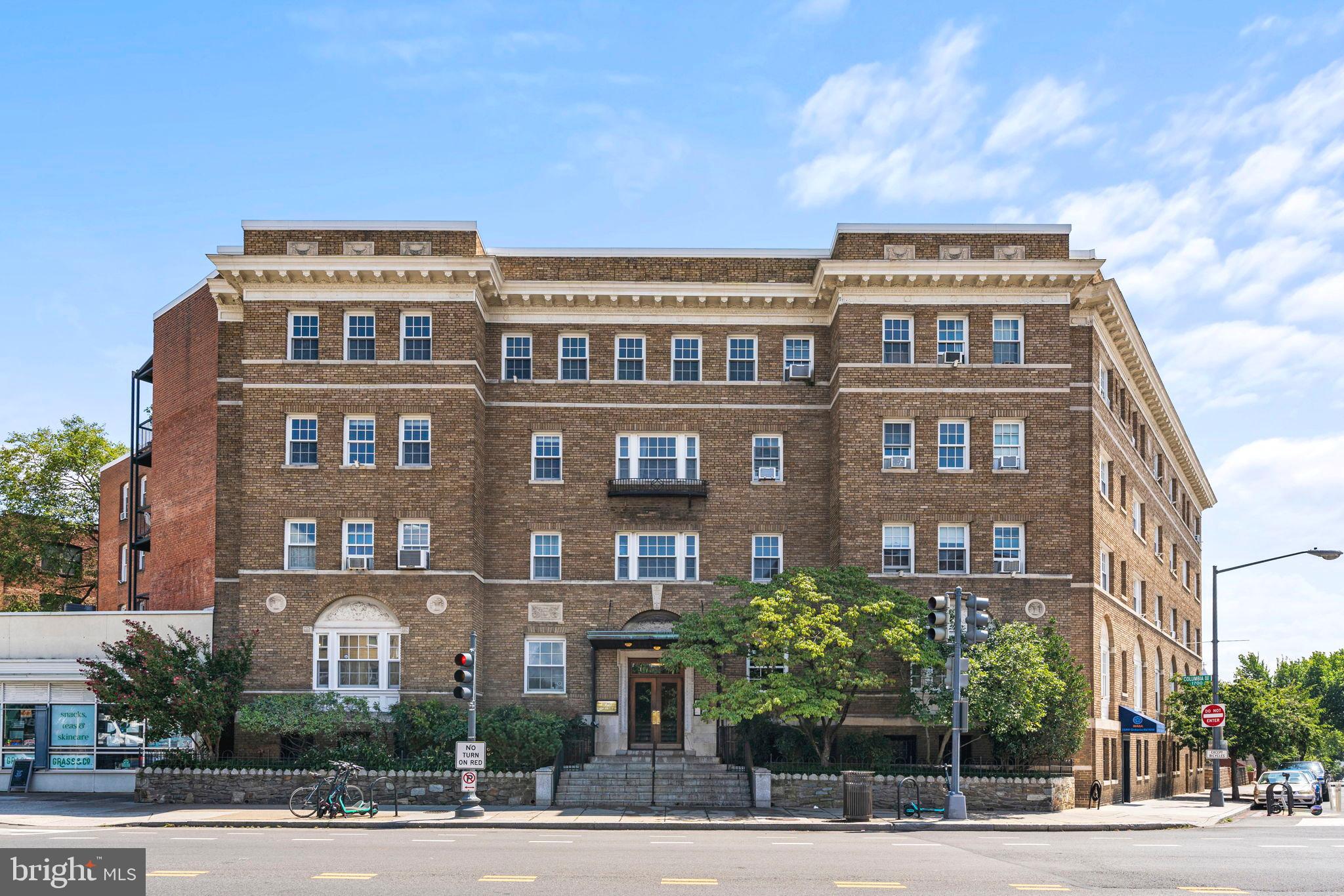 1736 Columbia Road Northwest, Unit 102 Washington, DC 20009 - Photo 33 of 39 a front view of a multi story building
